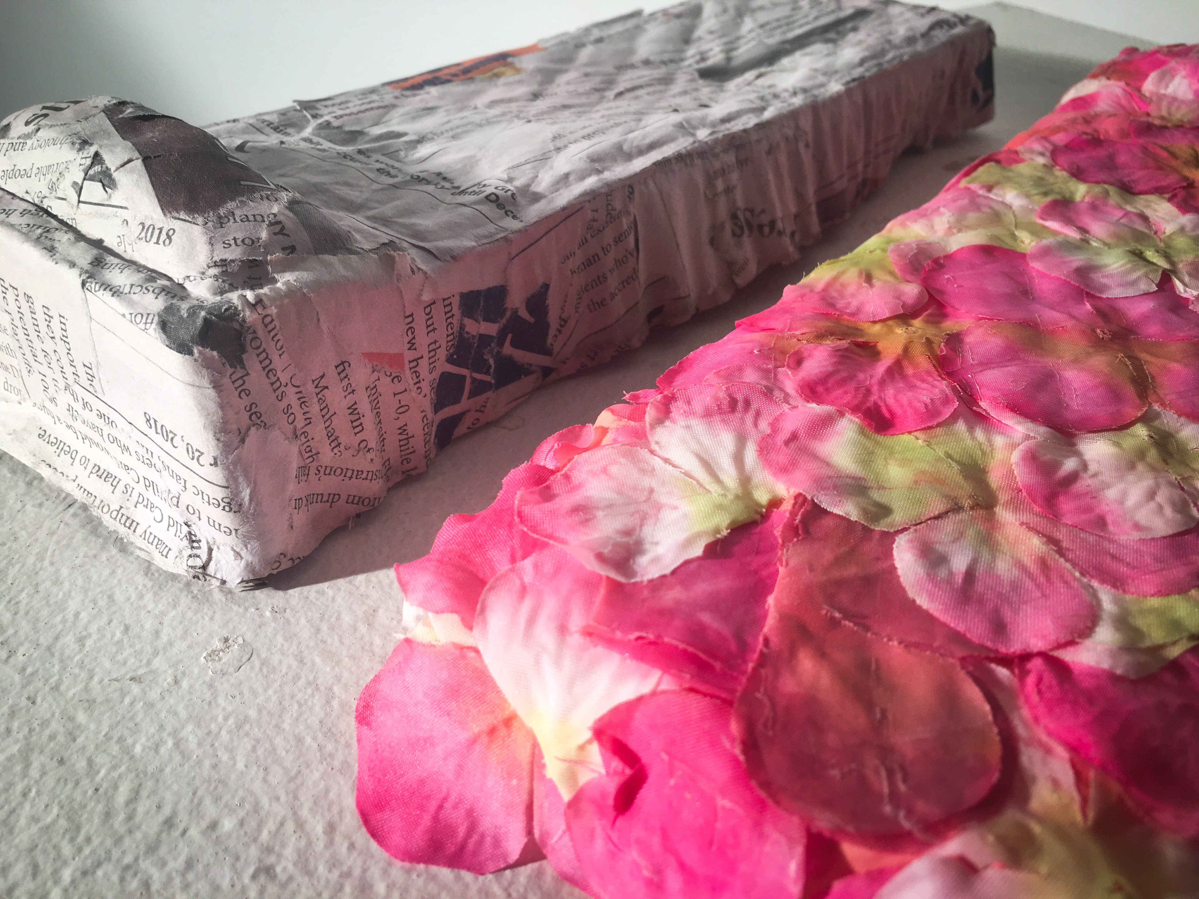 Newsprint, Fake Flowers cast as Beds