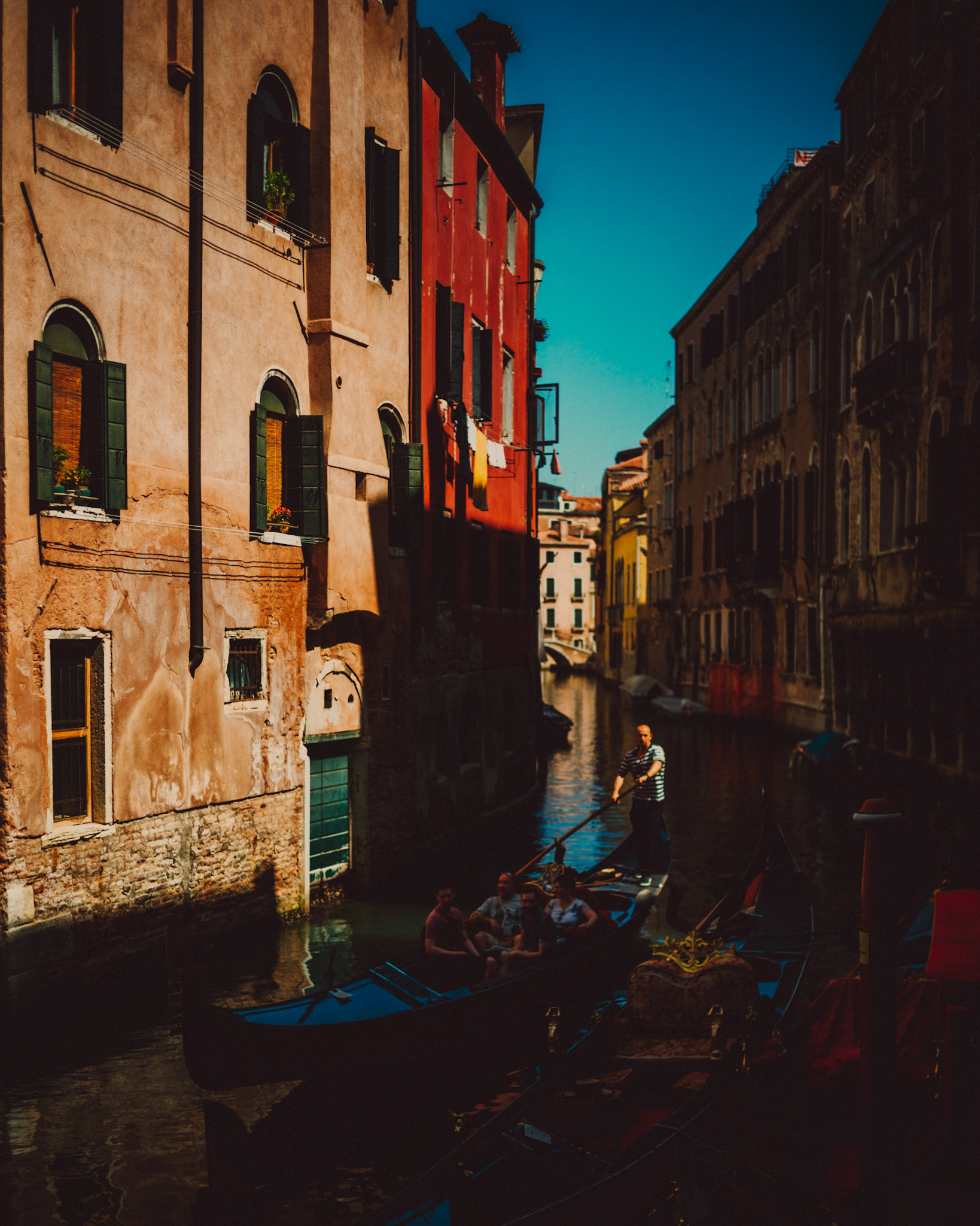 A gondolier in one of Venice's canals, Italy, August 2017, Leica M.