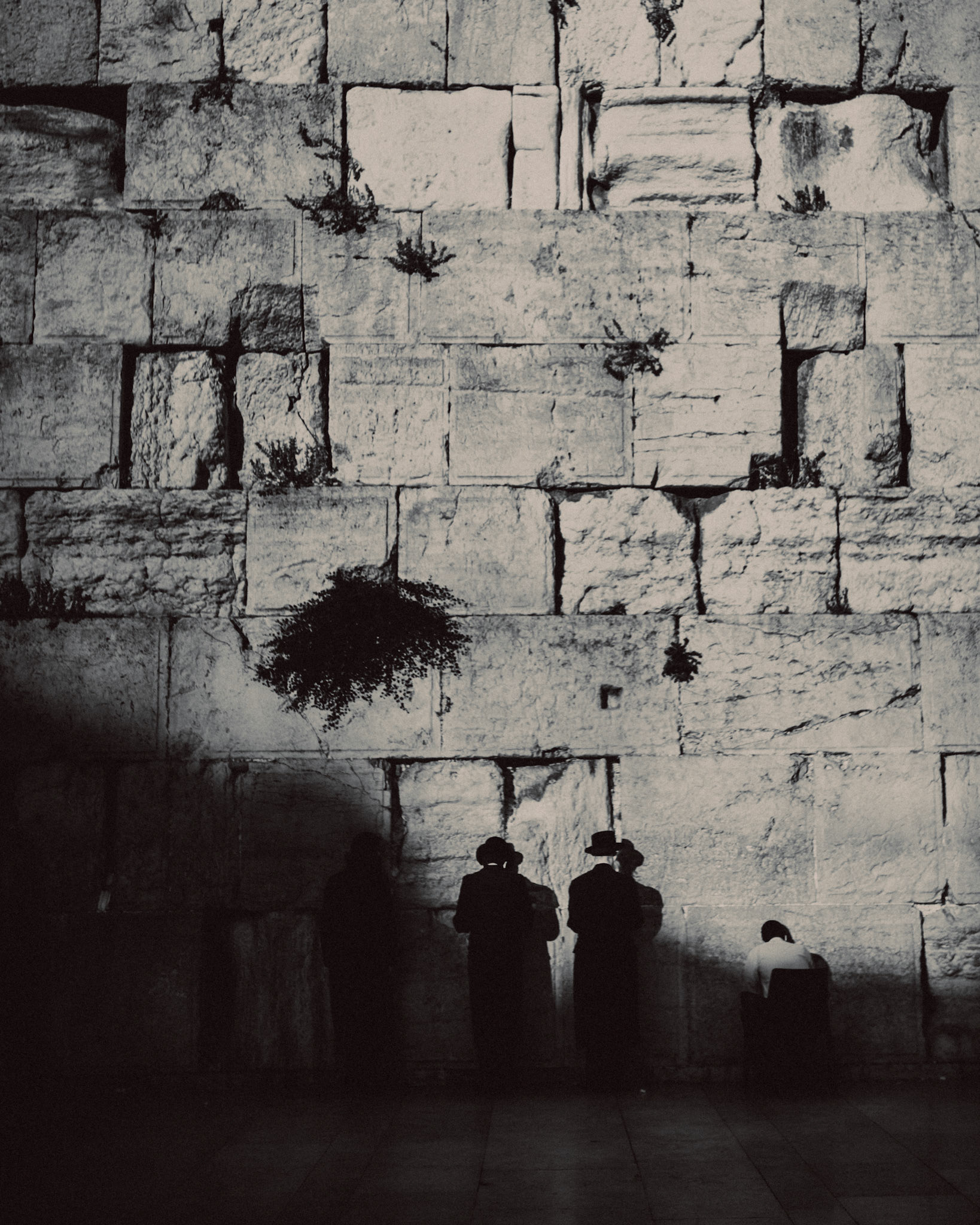 A black and white photo of Jewish Rabbis praying at the Western Wall, Jerusalem, Israel, July 2015, Leica M.