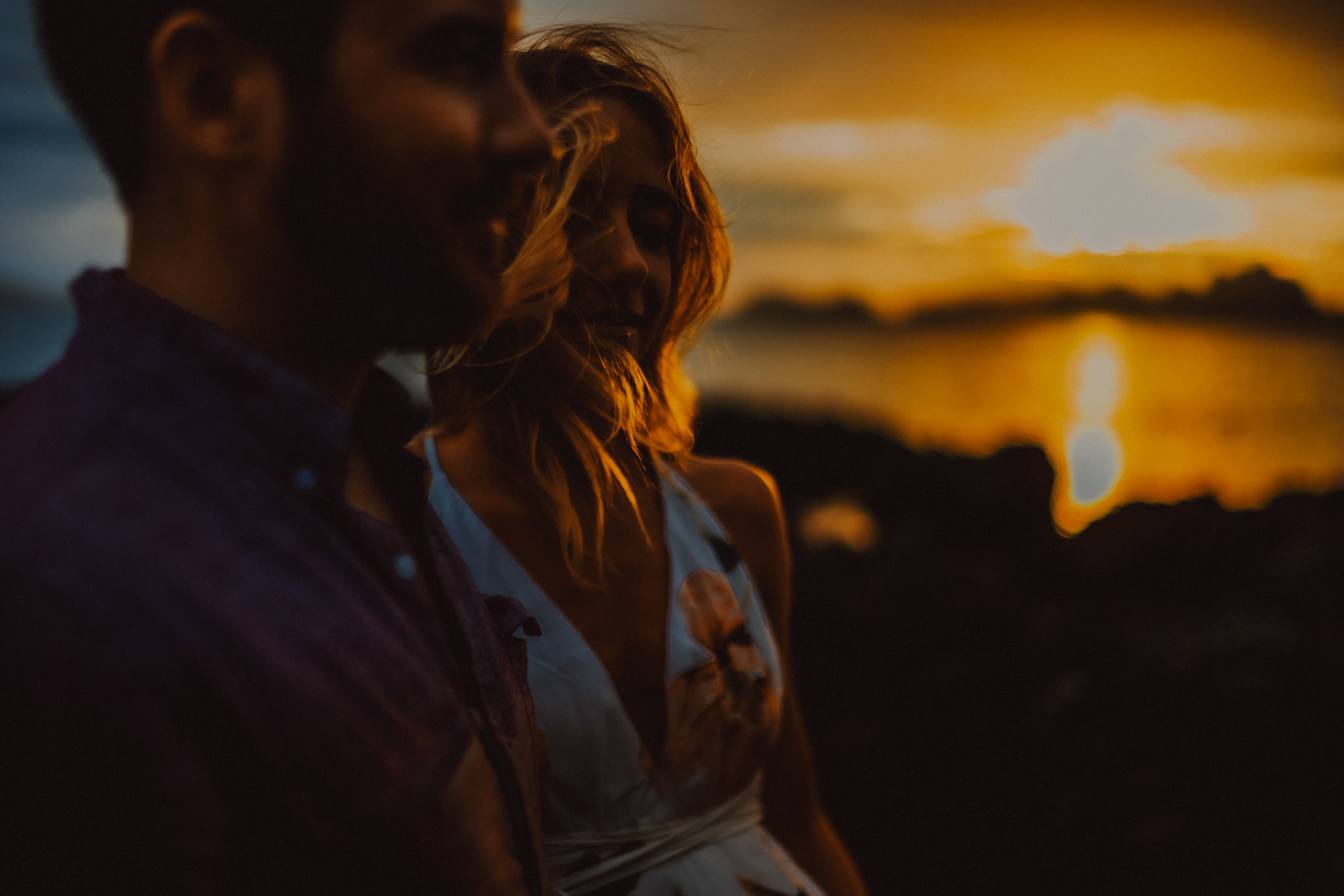Golden hour couple portraits with moody tones in Las Cabanas Beach, El Nido Palawan, Philippines, Southeast Asia, March 2019, Sony A7III.