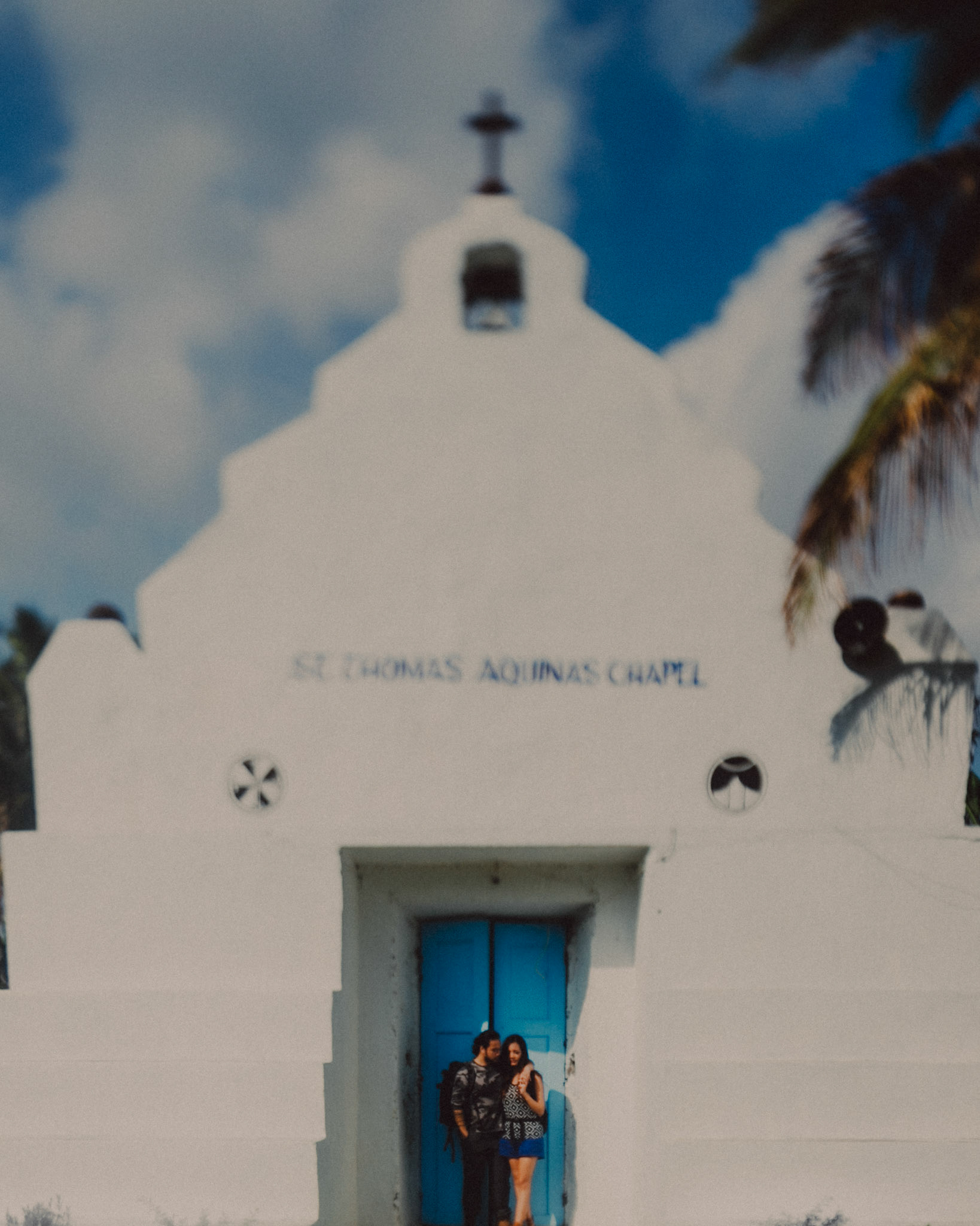 Couple portraits in front of the St. Thomas Aquinas Chapel using a tilt-shift lens, Sabtang Island, Batanes, Philippines, Southeast Asia, November 2014, Canon EOS 6D.