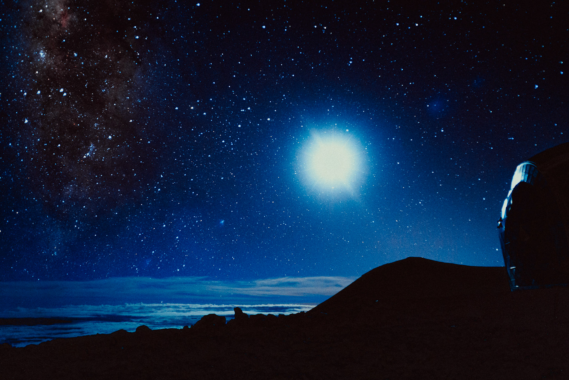 Night and astro travel photography in Mauna Kea Observatories (MKO): Keck Observatory and the Milky Way, Hilo, Hawaii, USA, September 2015, Sony A7S.