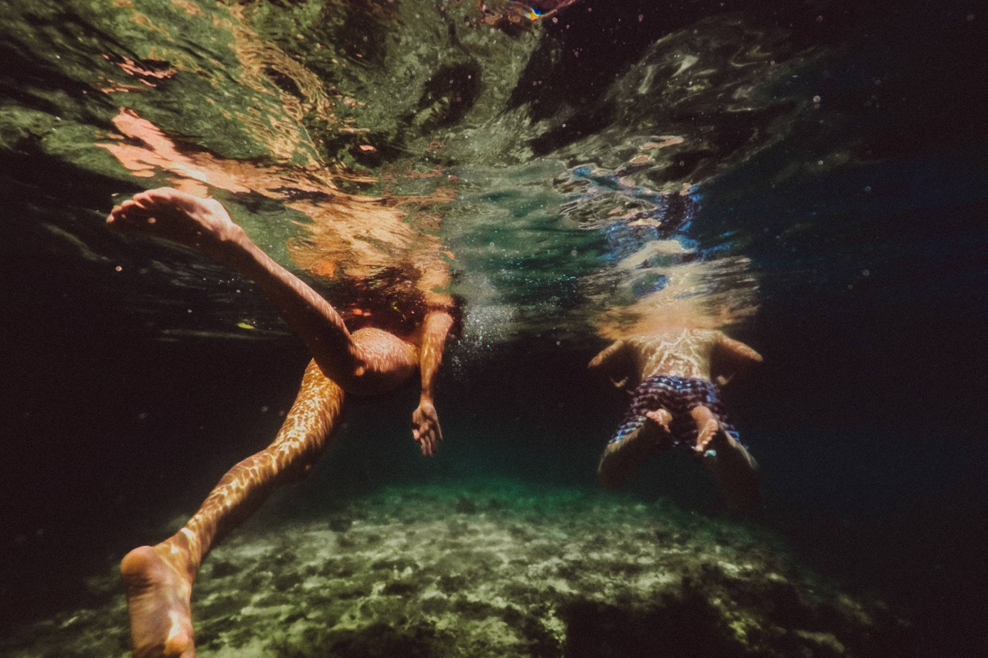 Underwater couple photography at the Twin Lagoon, from Renaud and Kat's island hopping adventure session in Coron, Palawan, Philippines, Southeast Asia, August 2018, Leica M