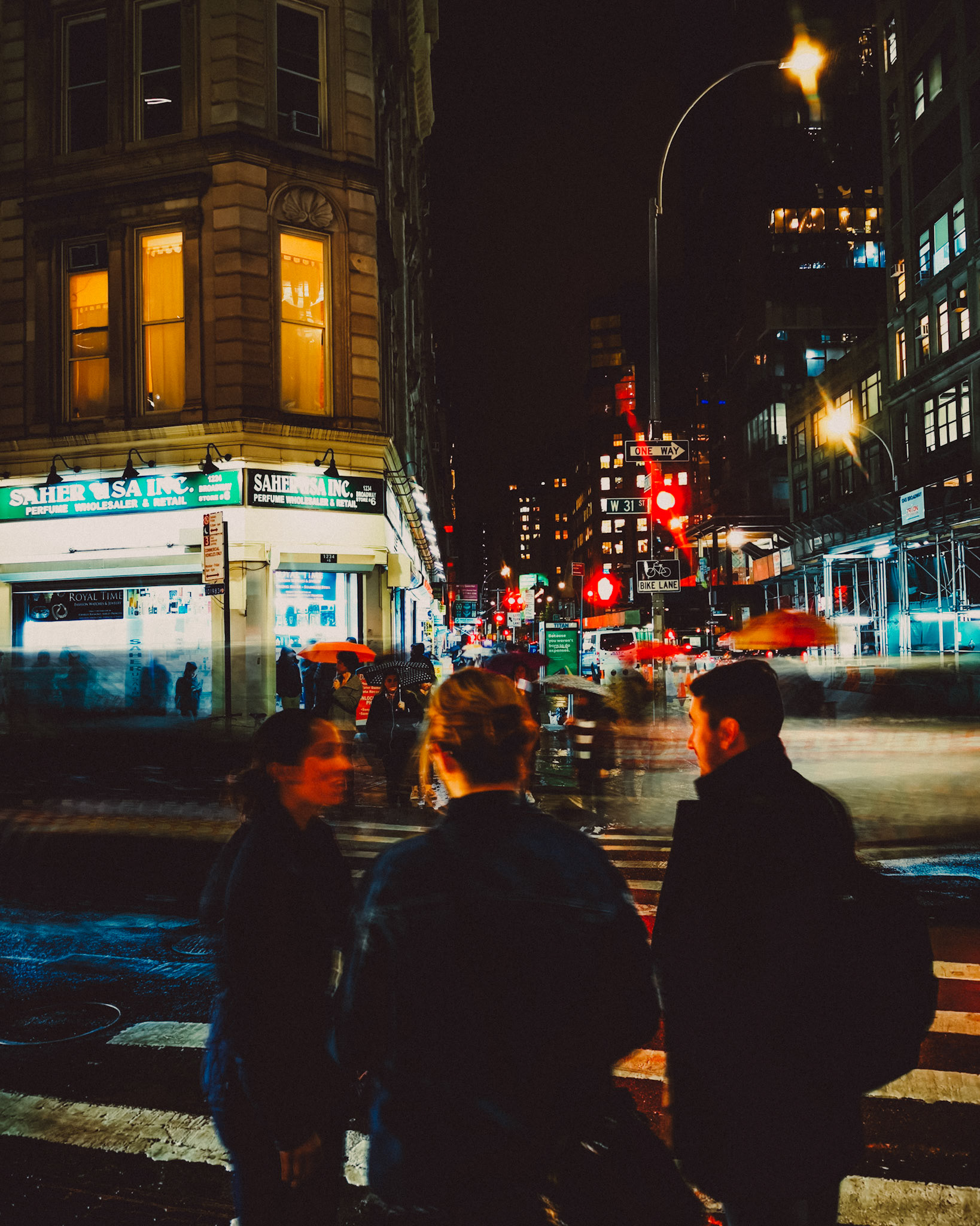 Pedestrians on a rainy night, Midtown, Manhattan, New York City, USA, November 2019, Huawei P30 Pro.