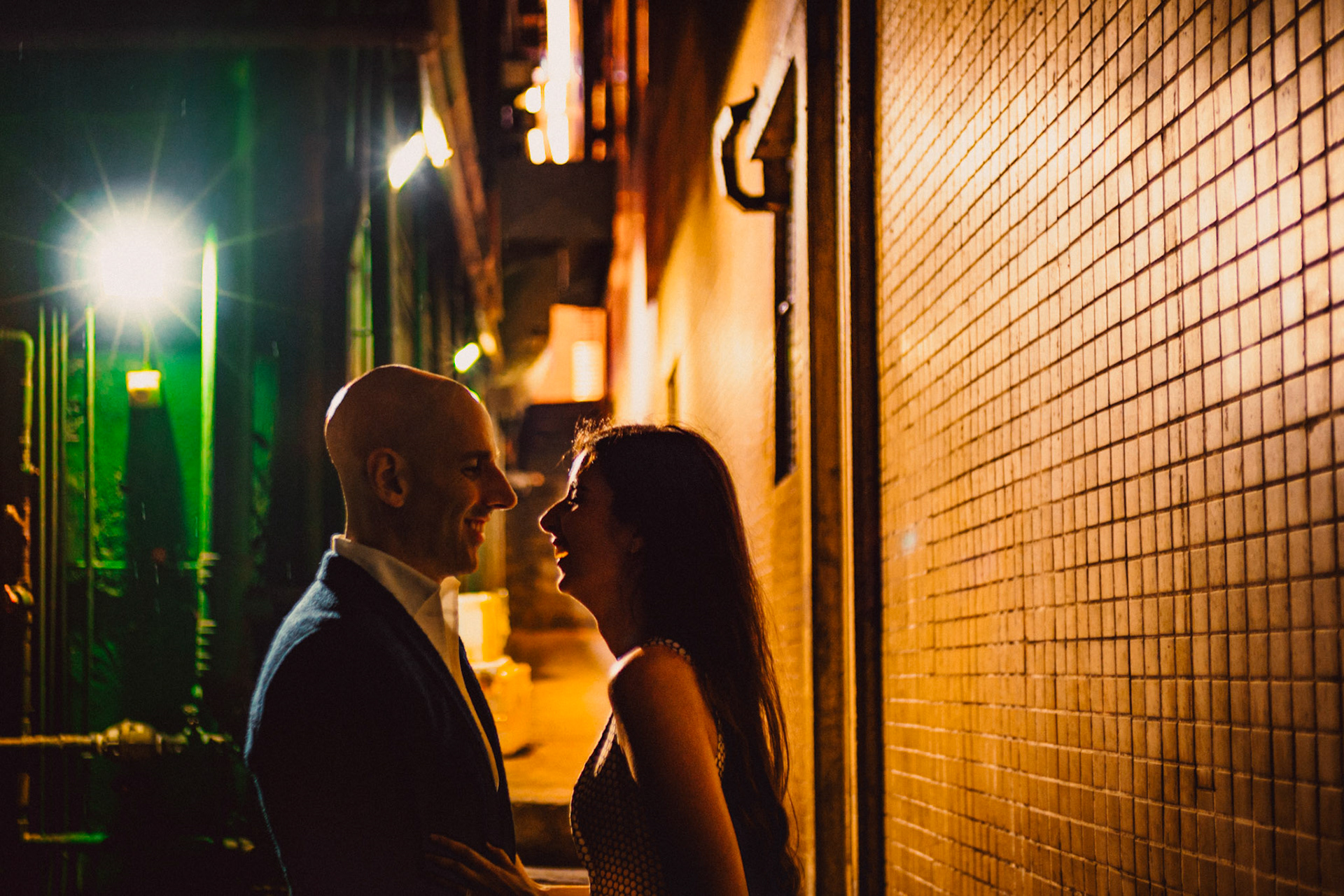 A moody and intimate late night urban engagement shoot in a prominently green alleyway in Stanley Street, from Eric and Sabrina's prewedding shoot in Central, Hong Kong, April 2019, Sony A7III.