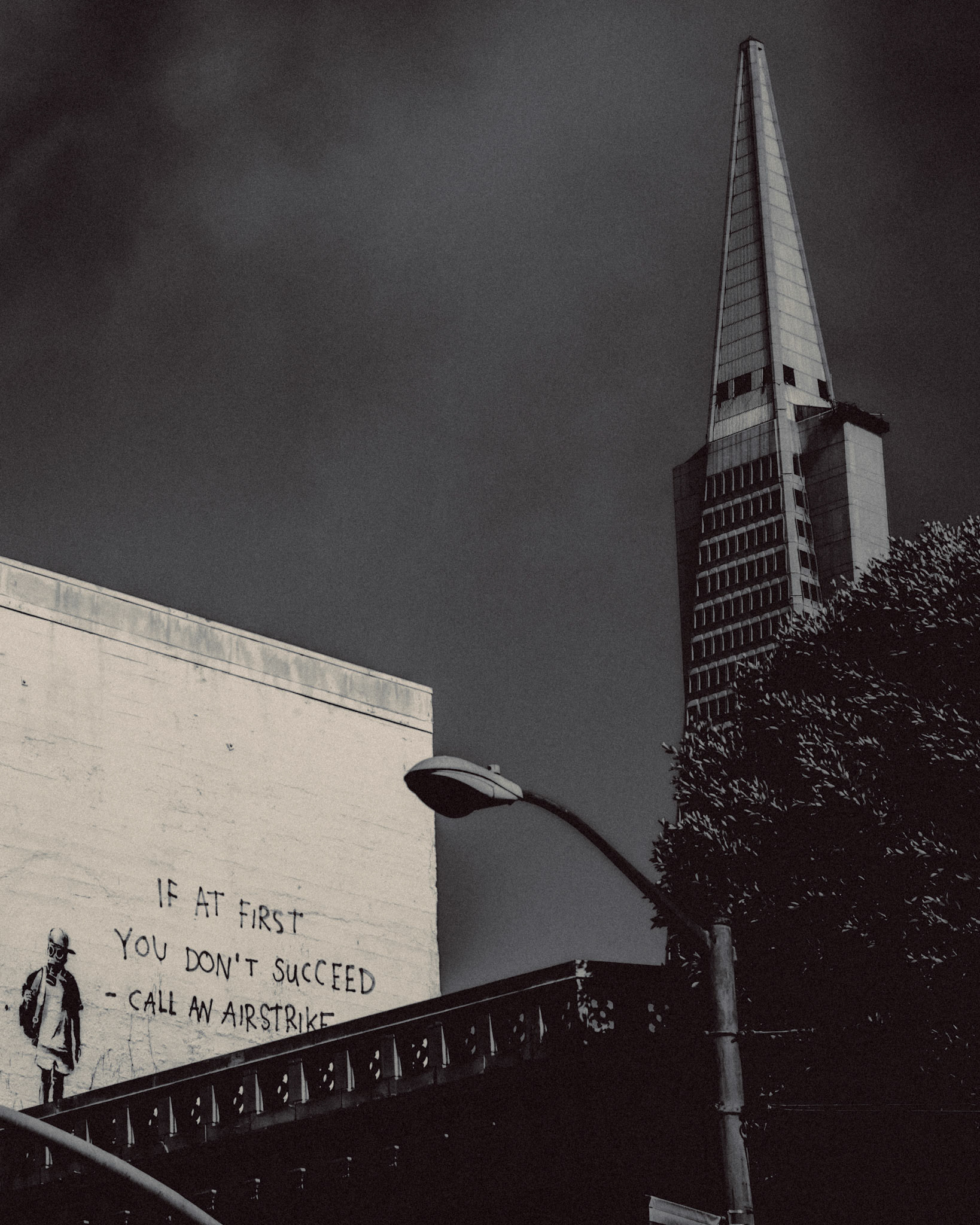 "If At First You Don't Succeed Call An Airstrike" Banksy and the Transamerica Pyramid, in black and white, San Francisco, California, USA, June 2016, Leica M.