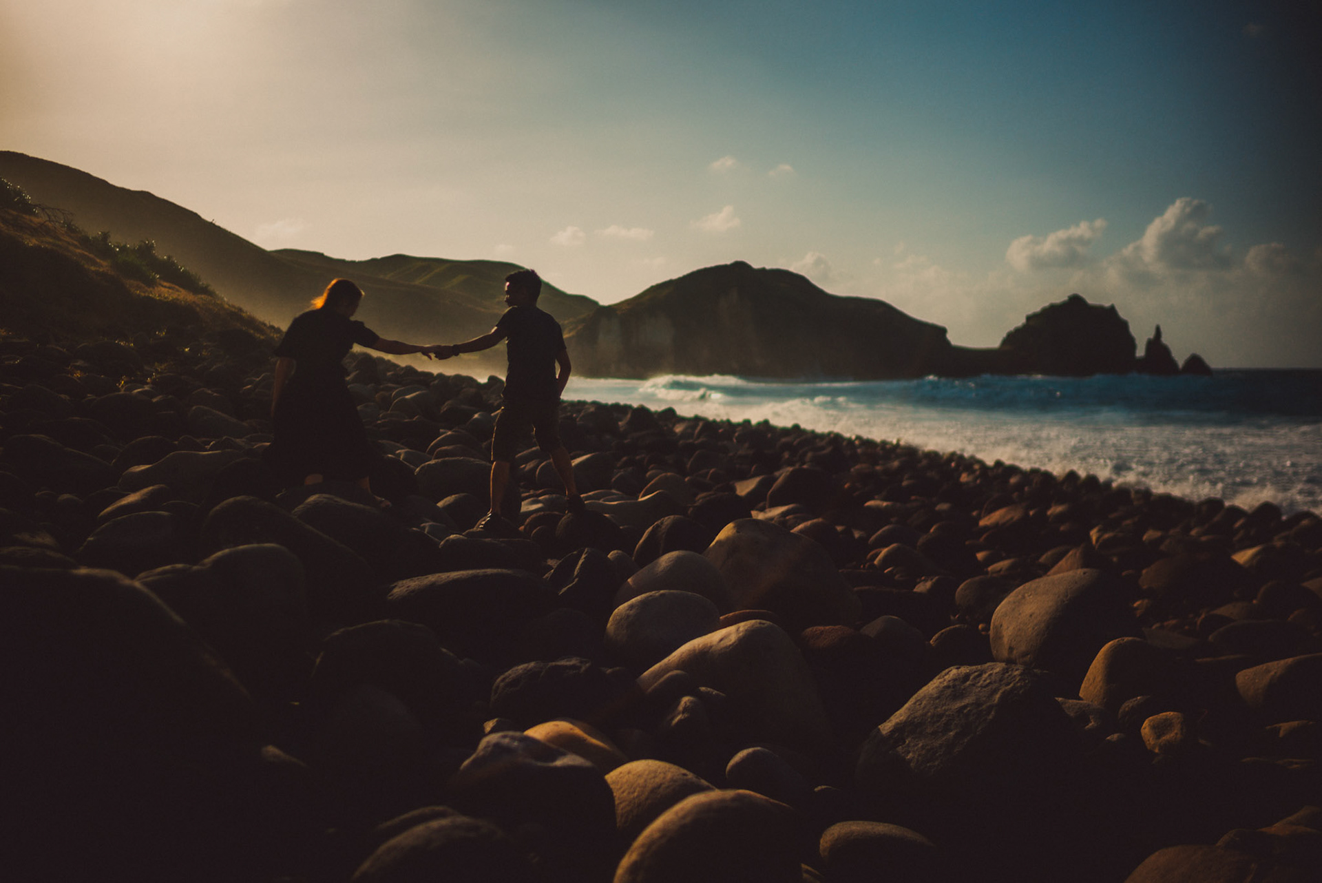 Moody and cinematic couple portraits from Owen and Nikka's adventure prenup photoshoot in Chadpidan Boulder Beach, Batanes, Philippines, Southeast Asia, October 2017, Leica M.