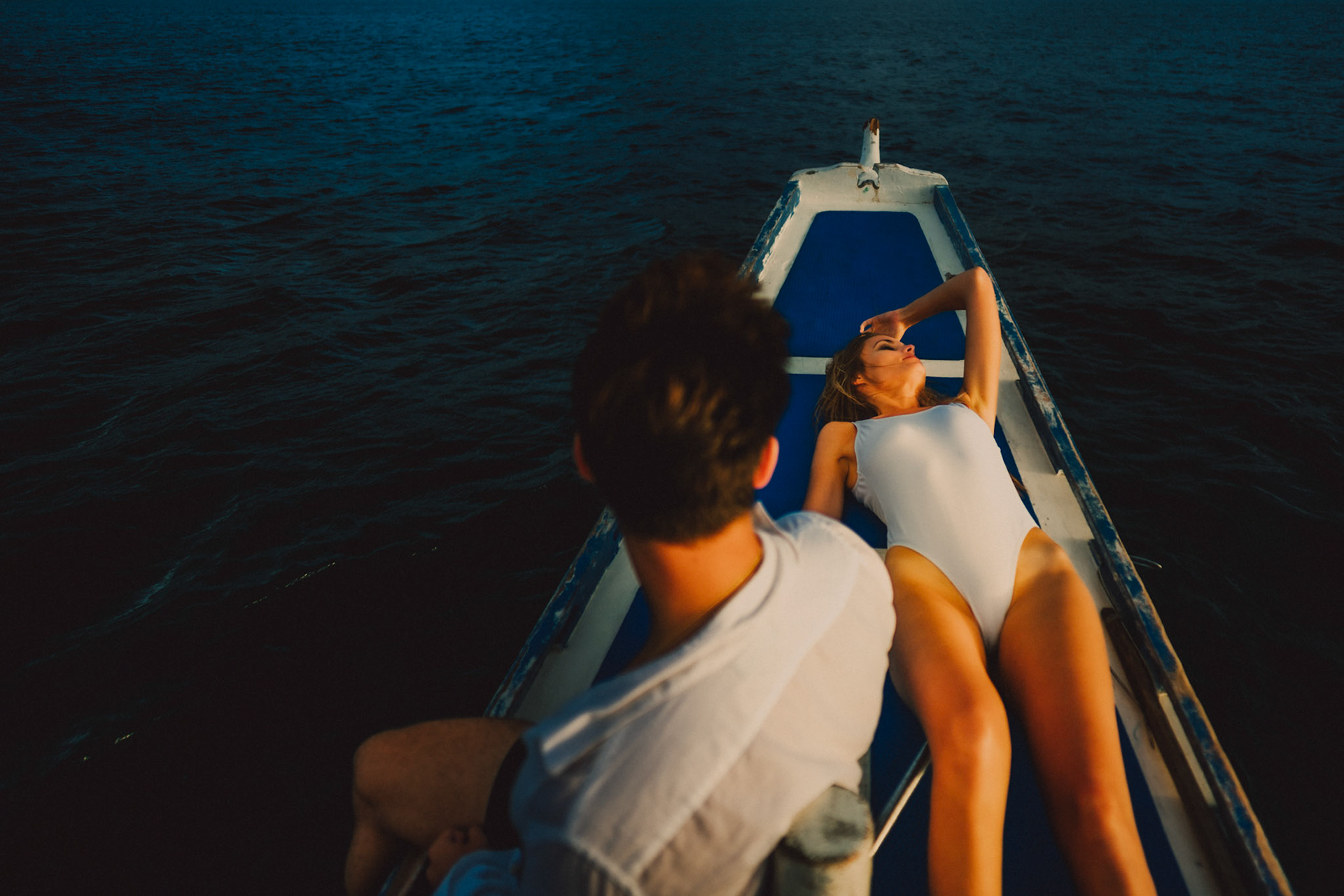Bacuit Bay sunset cruise island hopping adventure couple portraits during golden hour, El Nido, Palawan, Philippines, Southeast Asia, December 2019, Sony A7III.