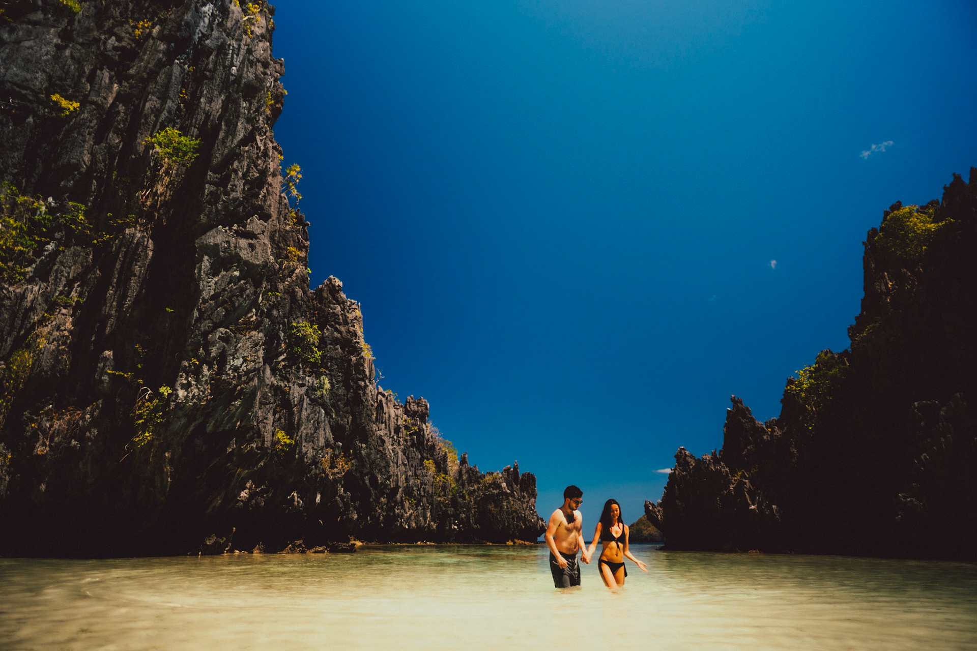 Honeymoon adventure couple photo shoot in Hidden Beach, Matinloc Island, El Nido, Palawan, Philippines, Southeast Asia, March 2020, Sony A7III.