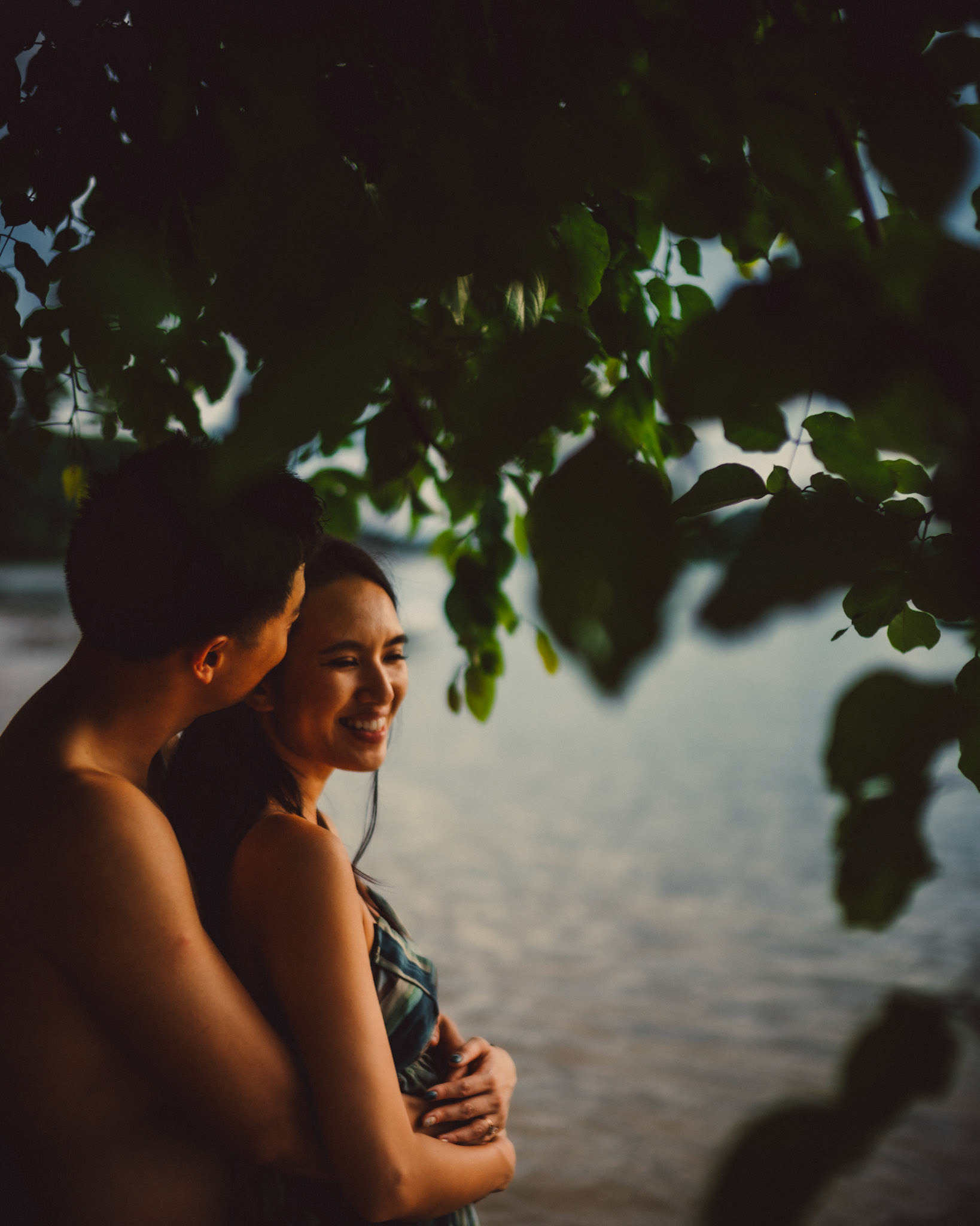 Intimate moments under a tree in front of Panorama Resort, from George and Allie's honeymoon portrait shoot in Corong-Corong Beach, El Nido, Palawan, Philippines, Southeast Asia, December 2018, Sony A7III