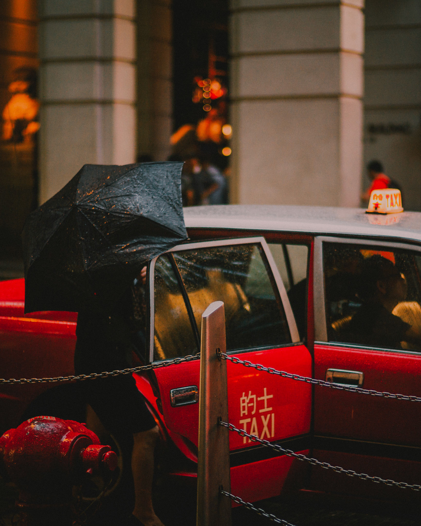 Riding a red taxi under the rain, Central, Hong Kong, May 2016, Leica M.
