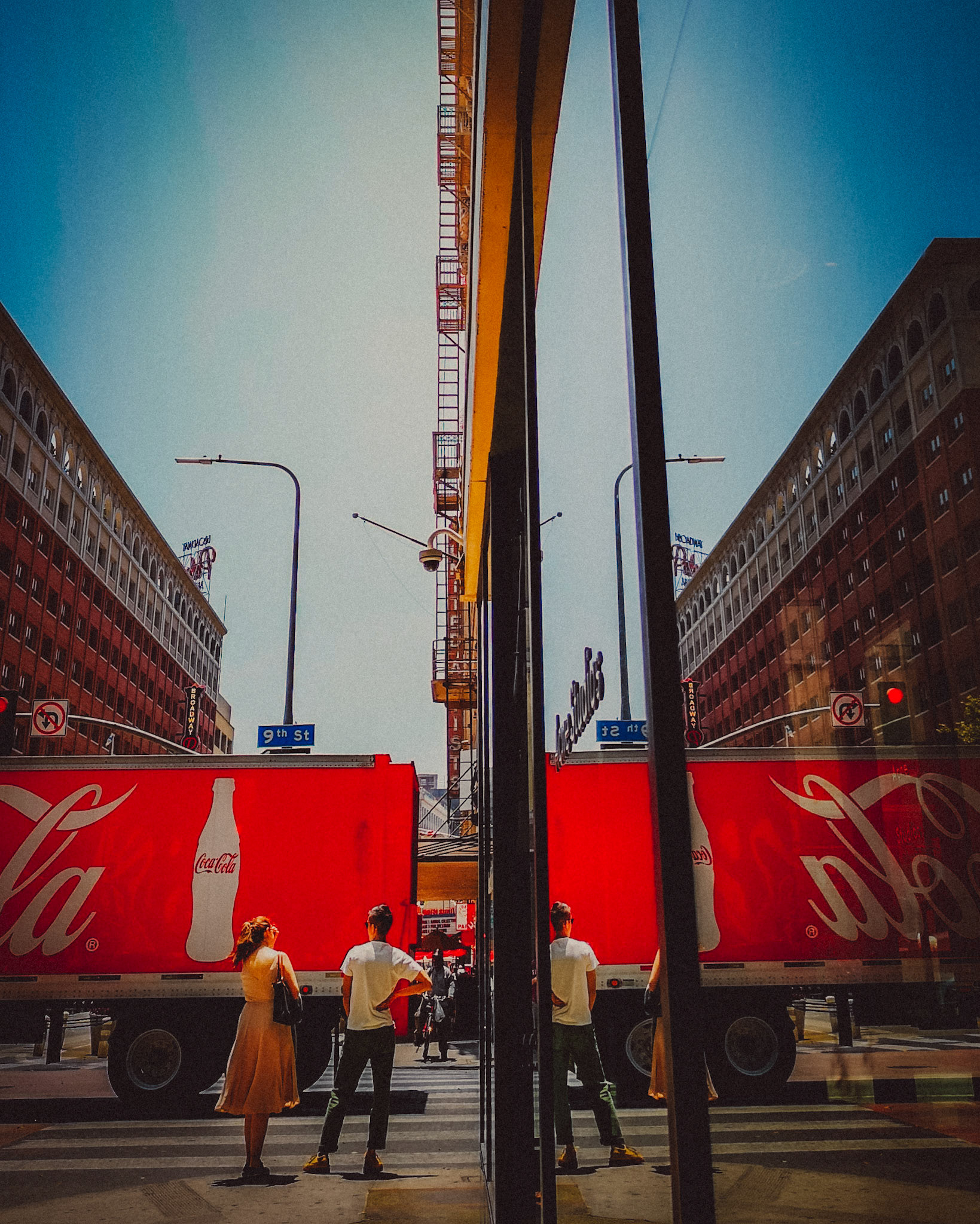 A street snapshot of a Coca-Cola truck and its reflection, DTLA, Los Angeles, California, USA, July 2018, Huawei P20 Pro.