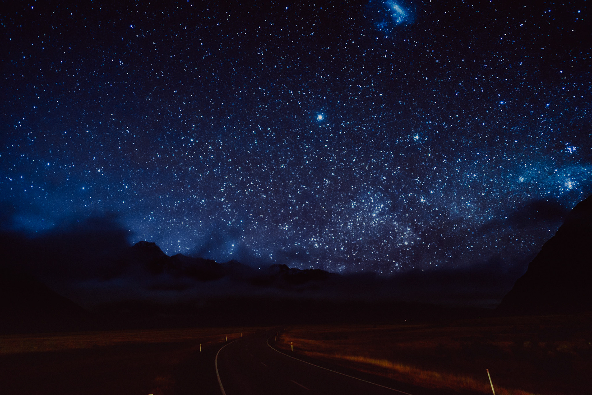 A starry night sky over an empty road, Aoraki/Mount Cook National Park, Canterbury, New Zealand, June 2017, Sony A7SII.
