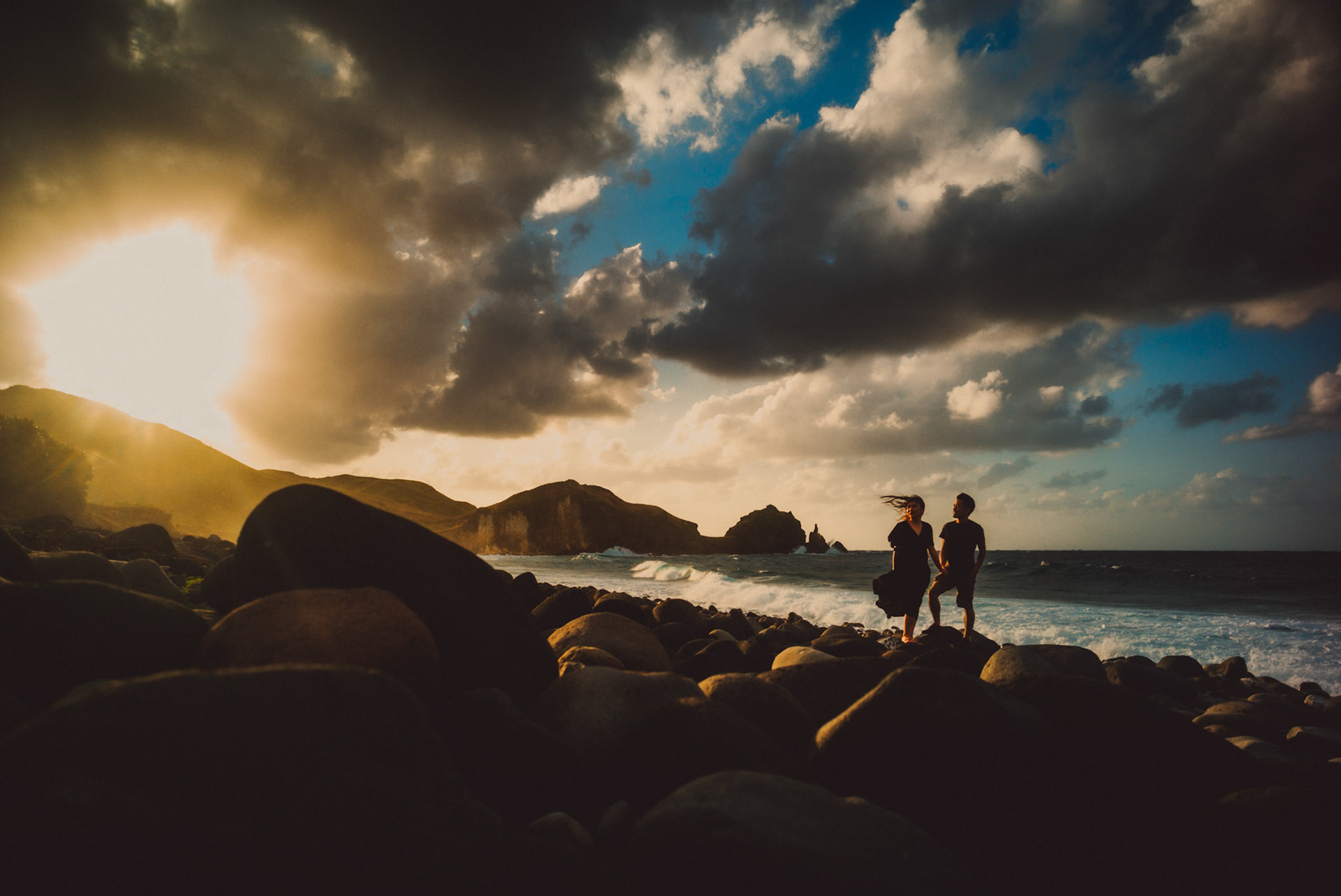 Sunset from behind a cliff from Owen and Nikka's adventure prenup photoshoot in Chadpidan Boulder Beach, Batanes, Philippines, Southeast Asia, October 2017, Leica M.