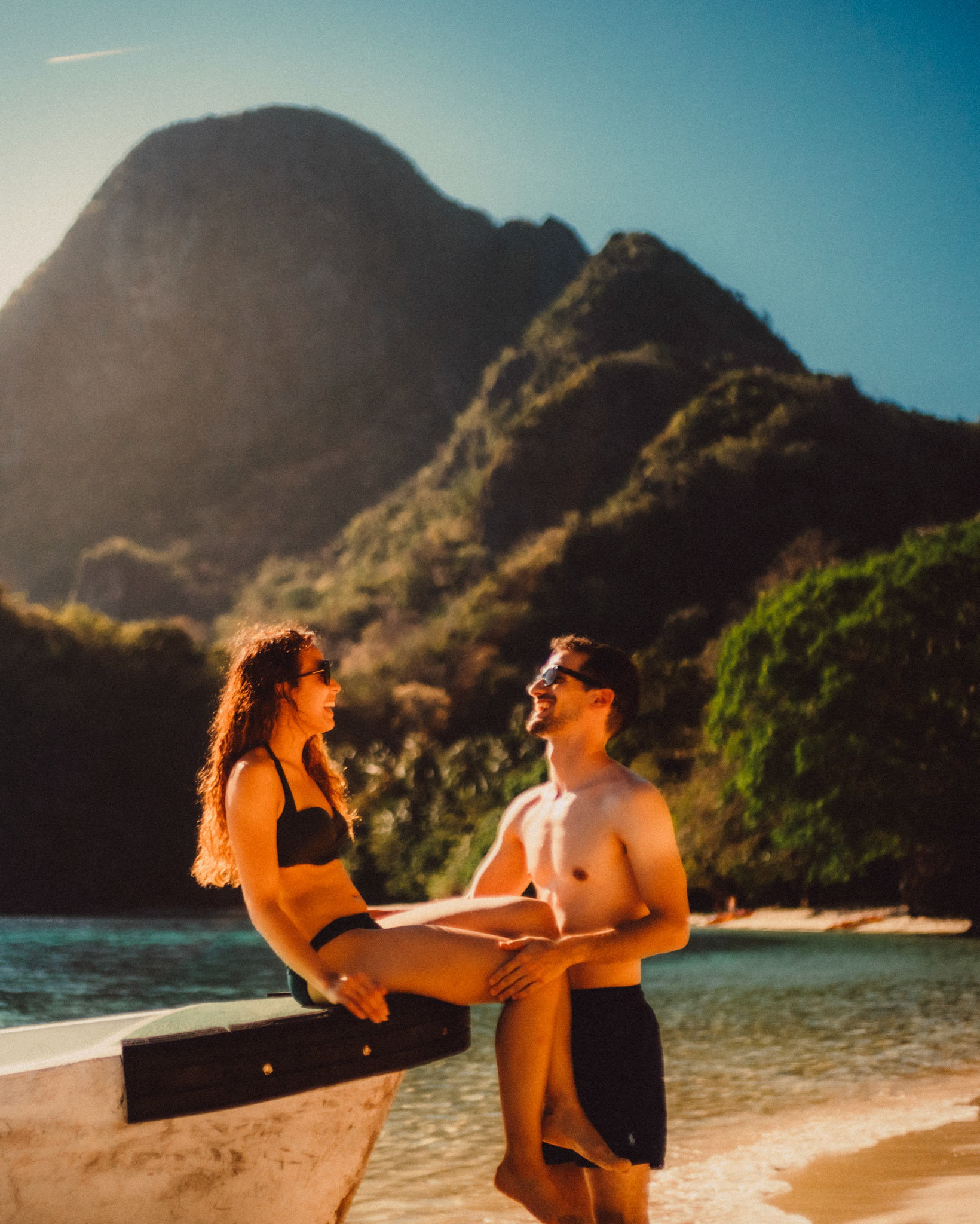 Candid and chill couple portraits in Paradise Beach, Cadlao Island, El Nido, Palawan, Philippines, Southeast Asia, April 2019, Sony A7III.