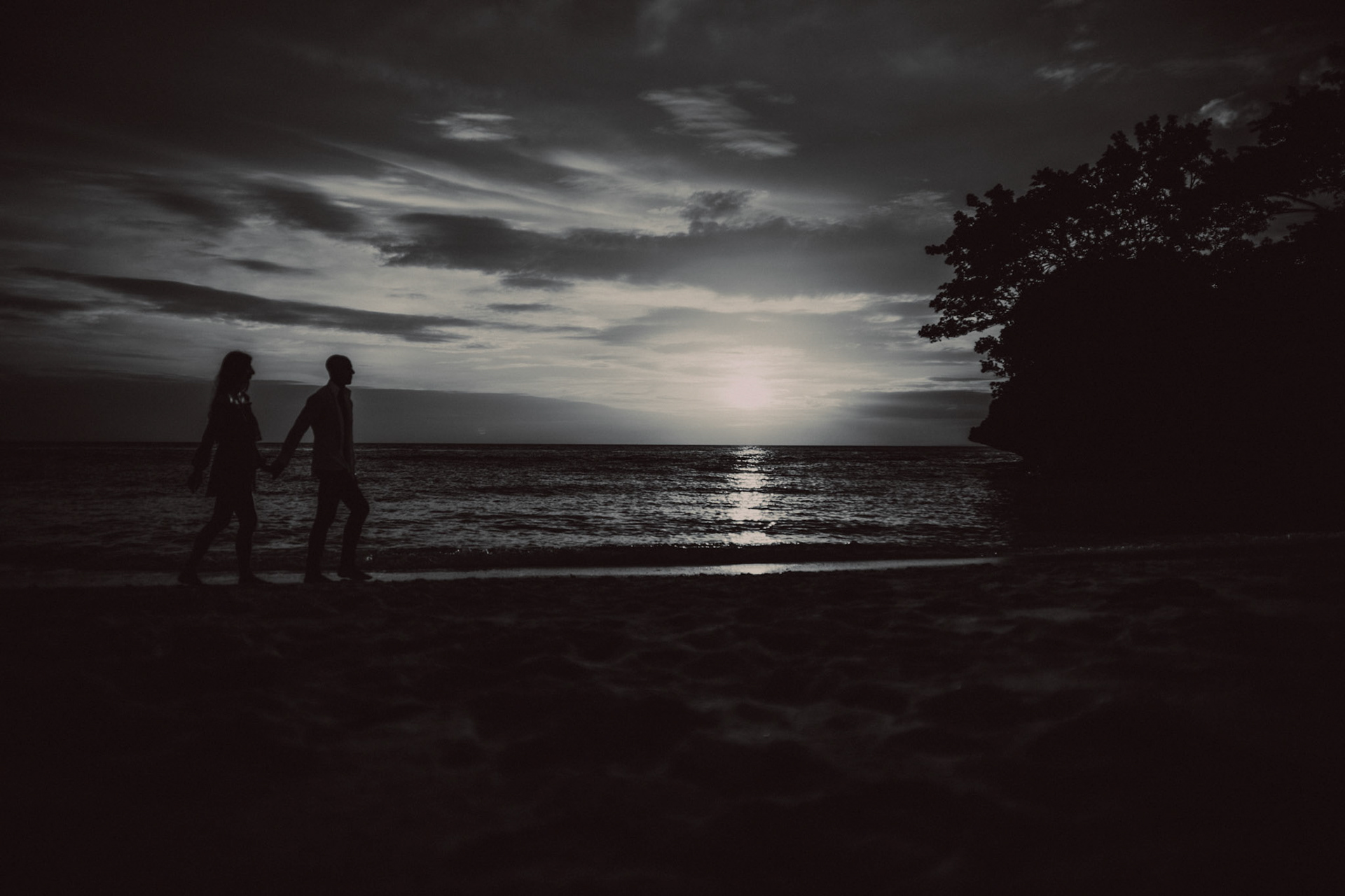 Sunset silhouette destination couple portraits at Punta Bunga Beach, in black and white, at Crimson Resort and Spa, Boracay, Philippines, Southeast Asia, December 2018, Sony A7III.