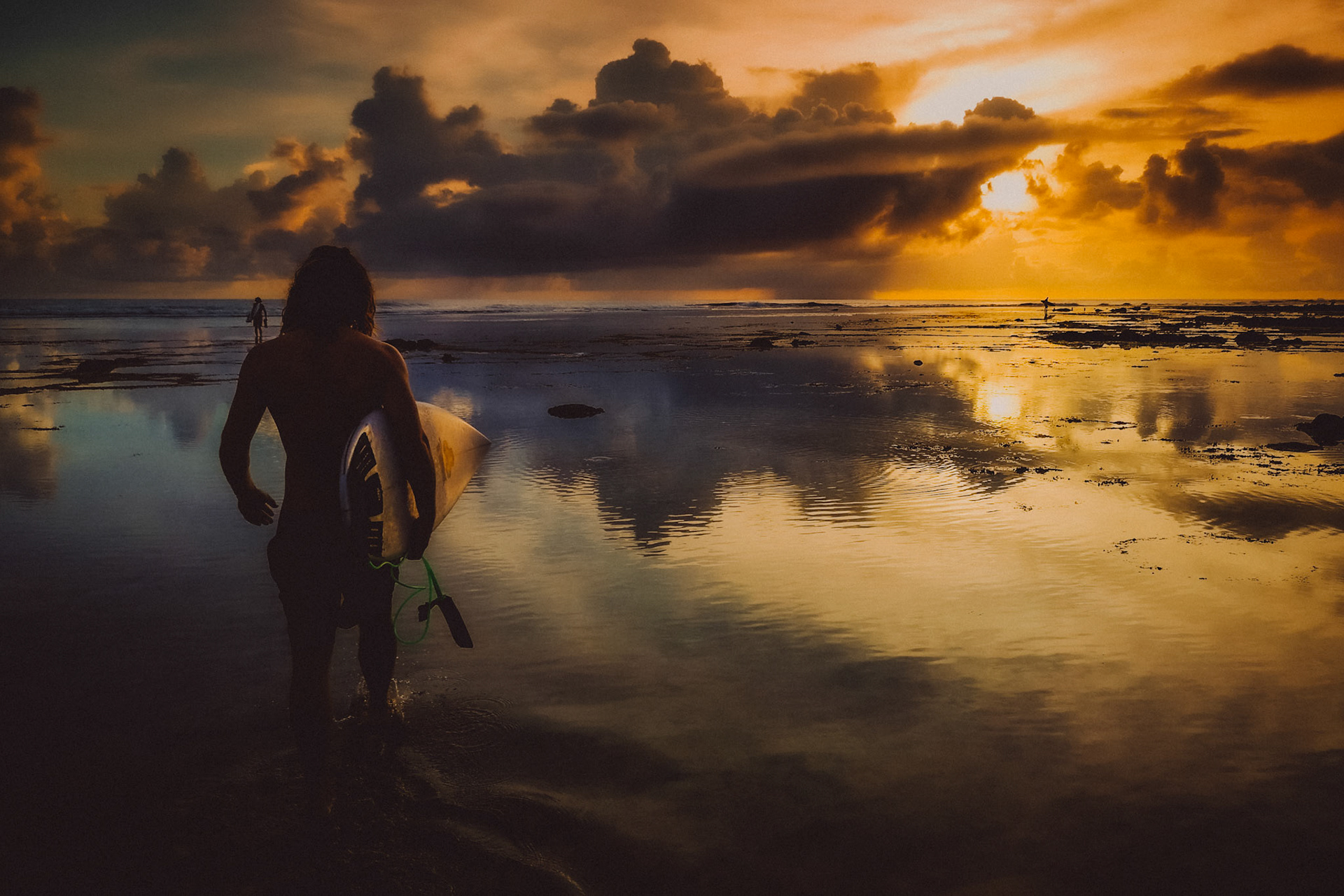 A surfer walking with his surfboard in Cloud 9 during sunrise, Siargao Island, Philippines, March 2019, Huawei P20 Pro.