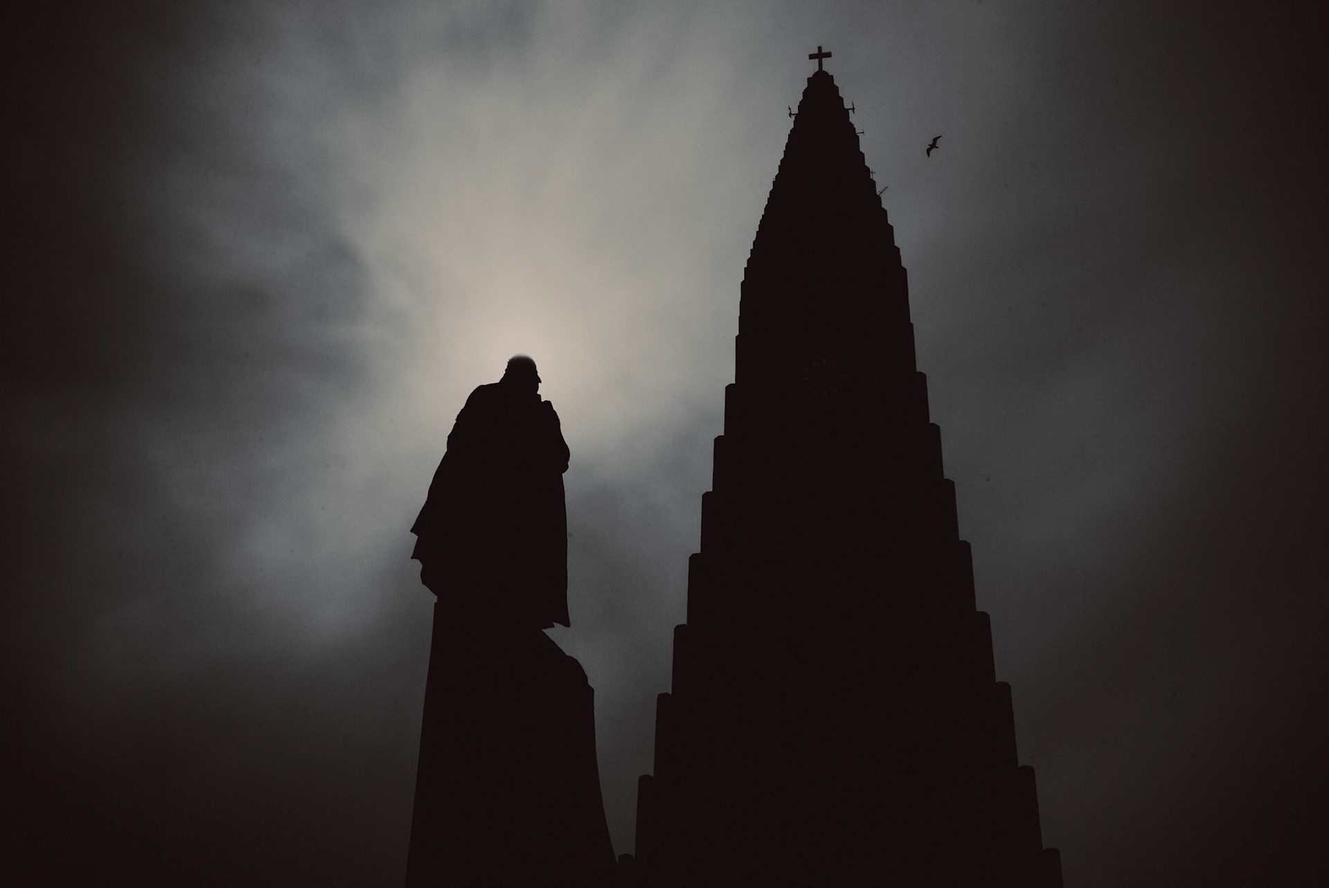 Leif Eriksson and the church steeple's silhouette, in black and white, Reykjavik, Iceland, May 2016, Leica M.