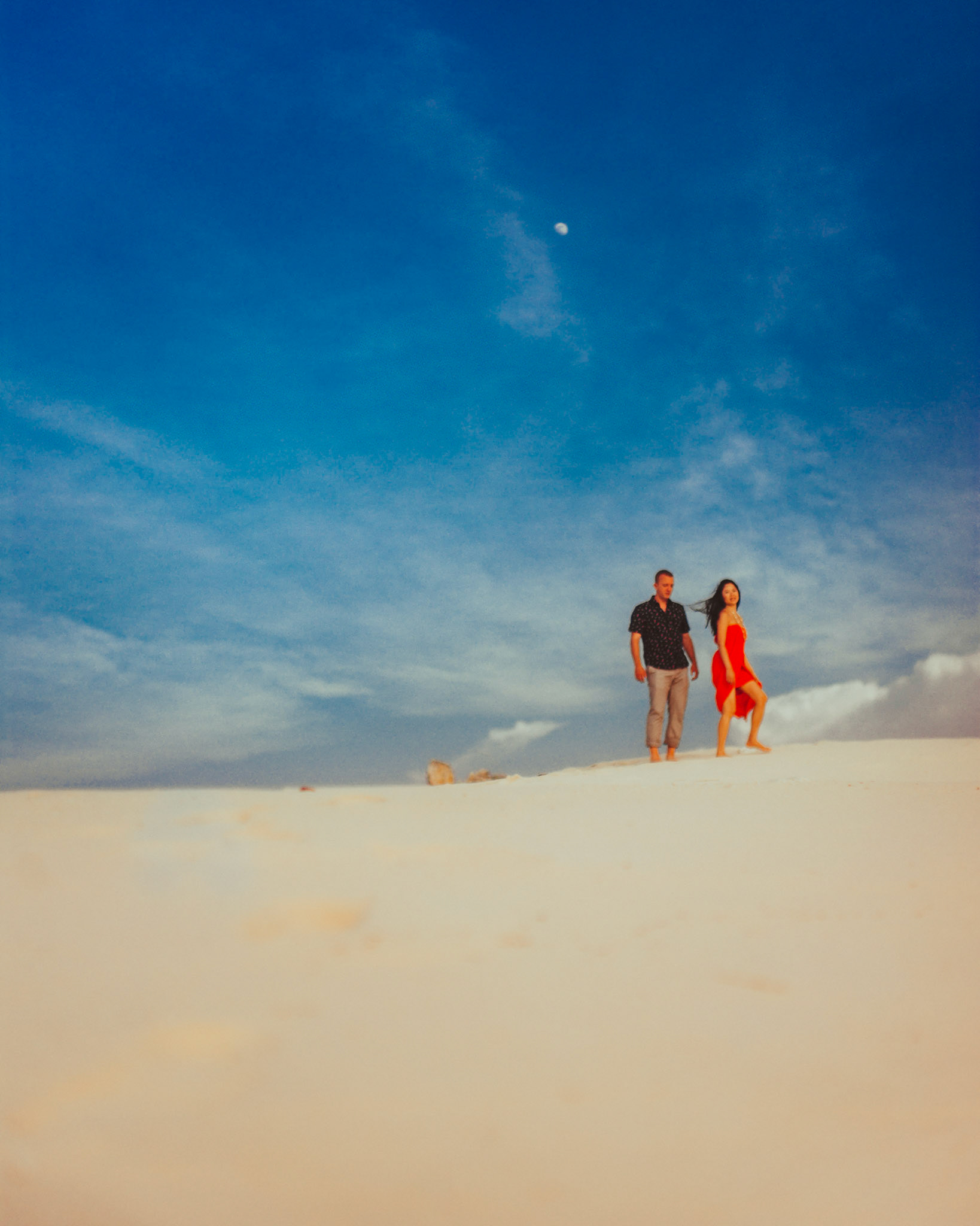 Chill couple portraits on a sand dune, from Renaud and Kat's island hopping adventure session in Malpagalen Island, Club Paradise, Coron, Palawan, Philippines, Southeast Asia, August 2018, Leica M