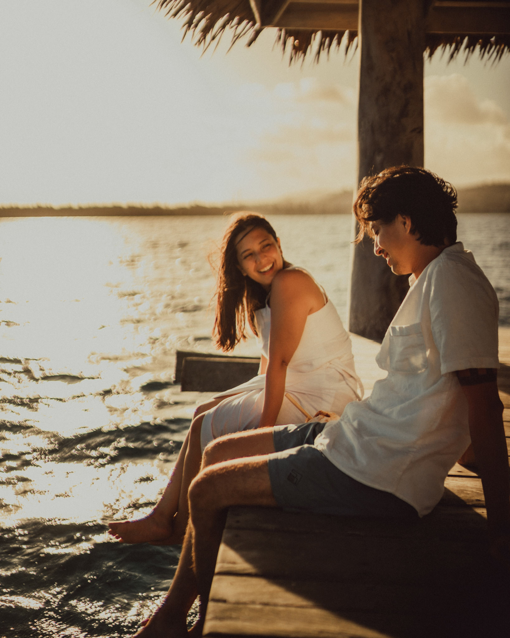 Chill newlywed portraits on Nay Palad Hideaway's floating pagoda in the middle of the sea, from Geo and Bianca's island hopping honeymoon couple portrait shoot in Siargao Island, Philippines, Southeast Asia, February 2020, Sony A7III