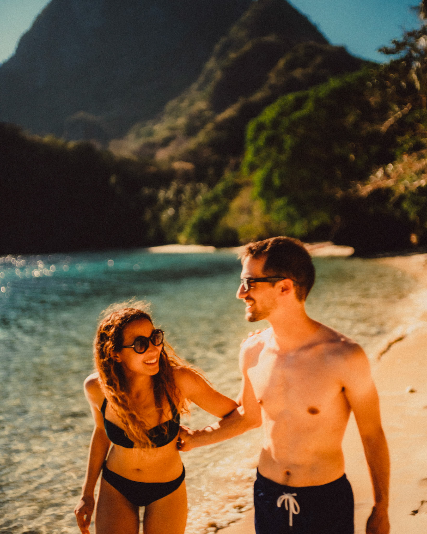 Candid and chill couple portraits in Paradise Beach, Cadlao Island, El Nido, Palawan, Philippines, Southeast Asia, April 2019, Sony A7III.