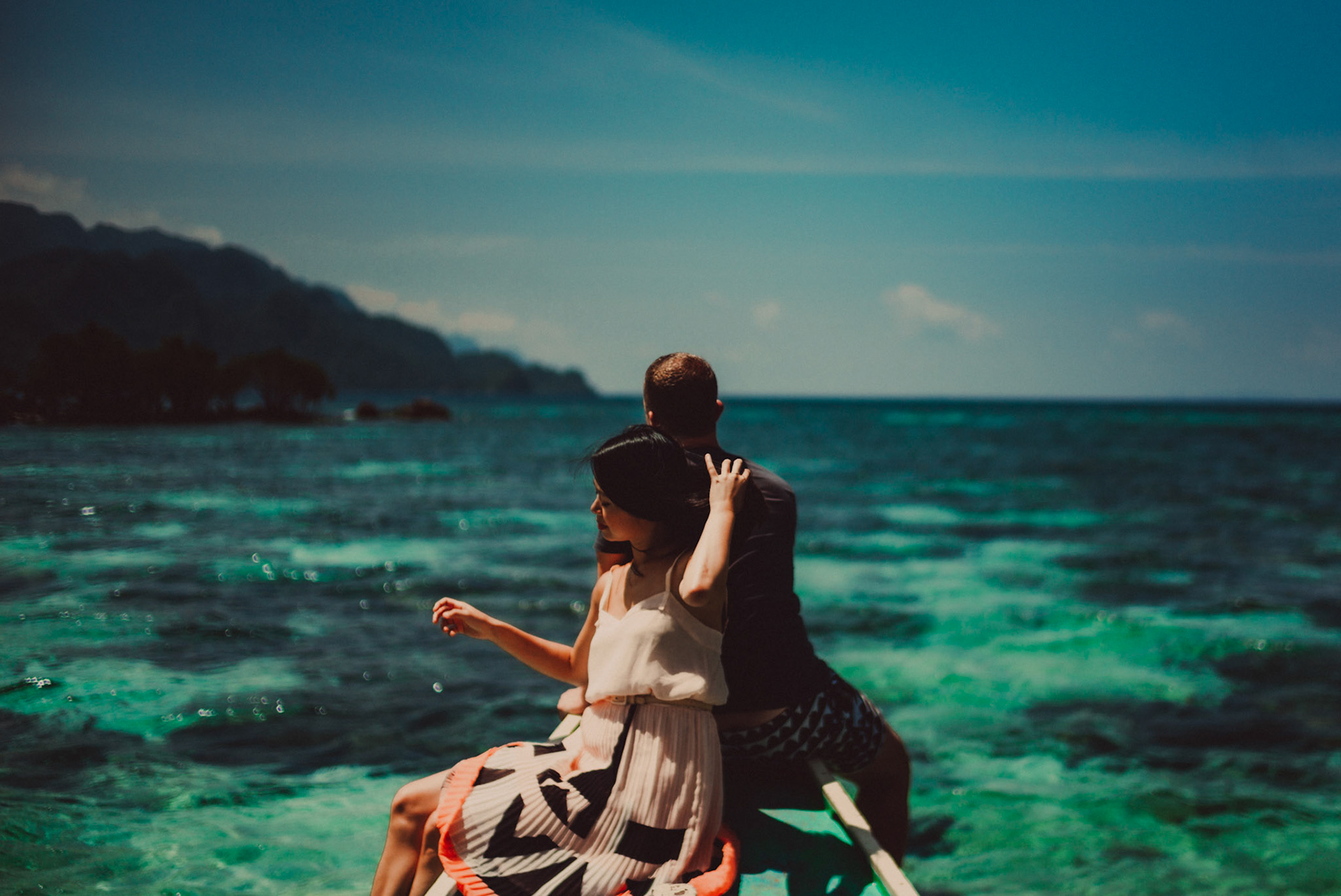 Couple portraits on an island hopping tour boat en route to Coron Island, from Renaud and Kat's island hopping adventure session in Coron, Palawan, Philippines, Southeast Asia, August 2018, Leica M