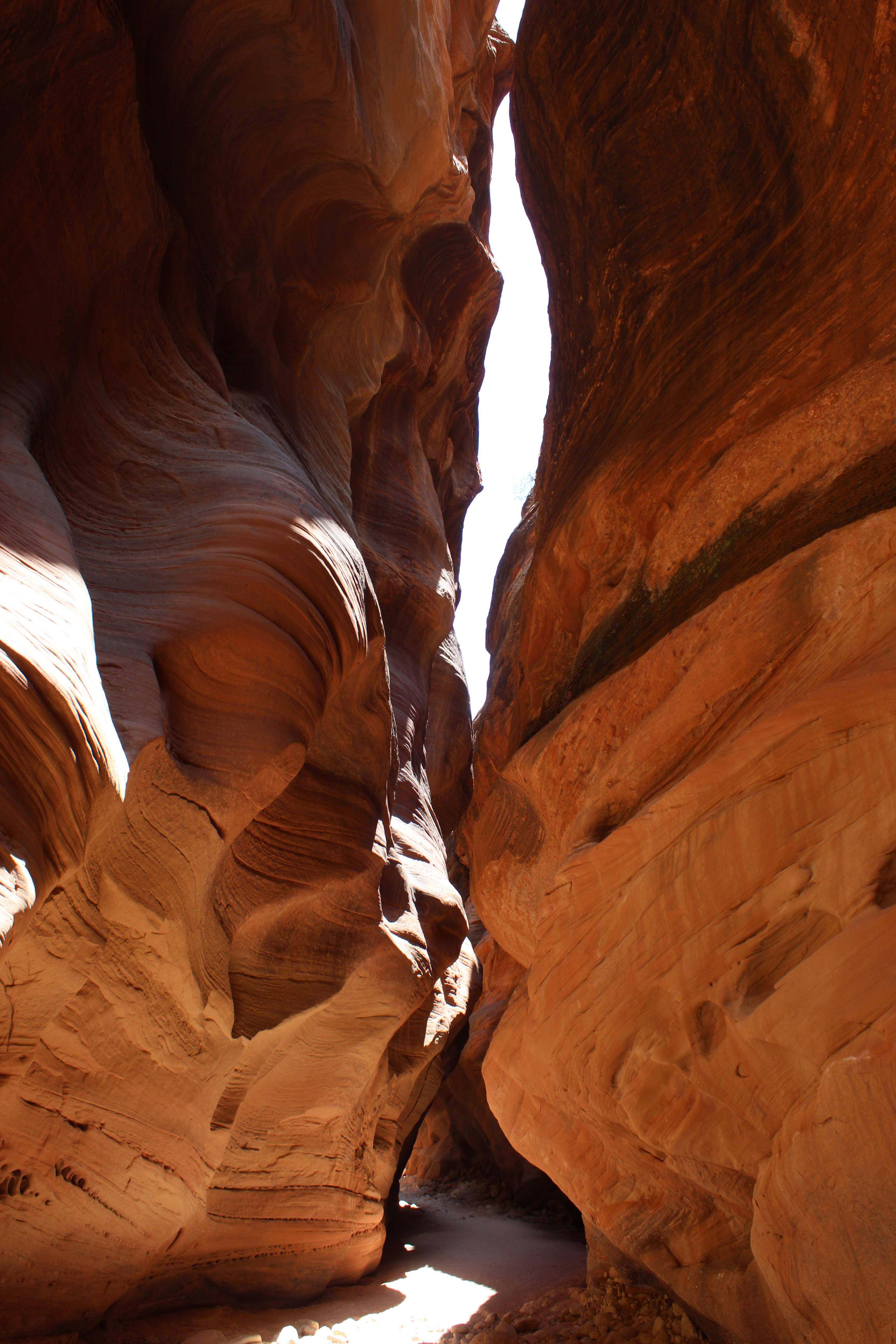 Sun through the rocks of a slot canyon