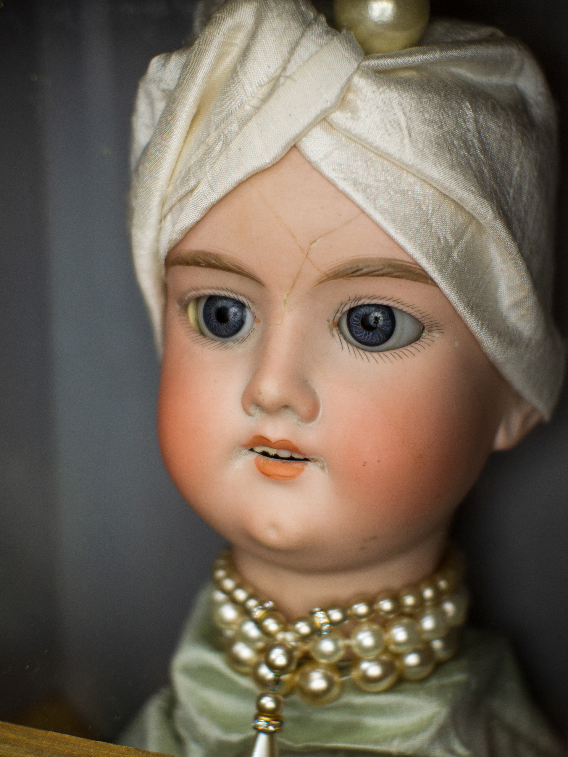 All Dressed Up (And Nowhere To Go) - Antique wooden case, antique bisque doll’s head (Amande Marseille 1900 German), silk, vintage glass jewellery. 40 x 31 x 18
