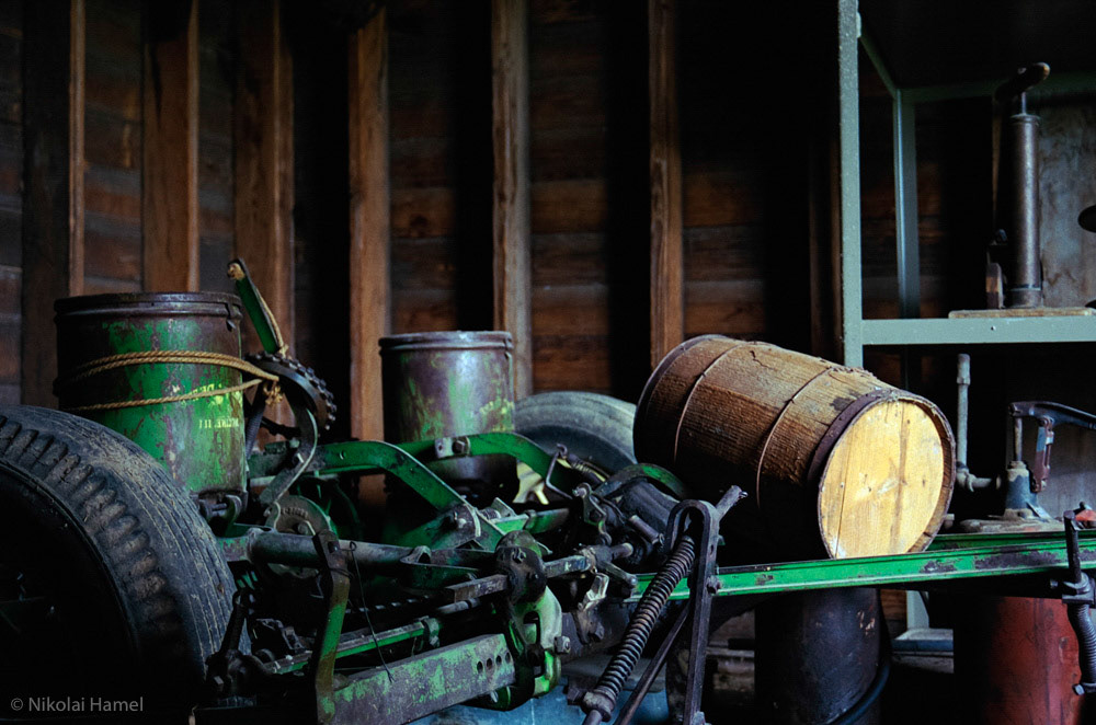 Farm Equipment in a Barn. Canon A-1, Kodak Portra 400. Underexposed 1/2 stops..