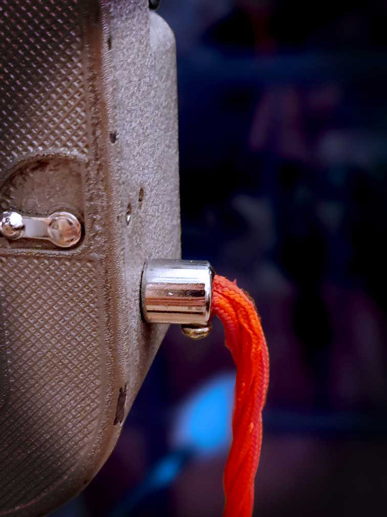 Chrome cord grip with vintage red braided cable