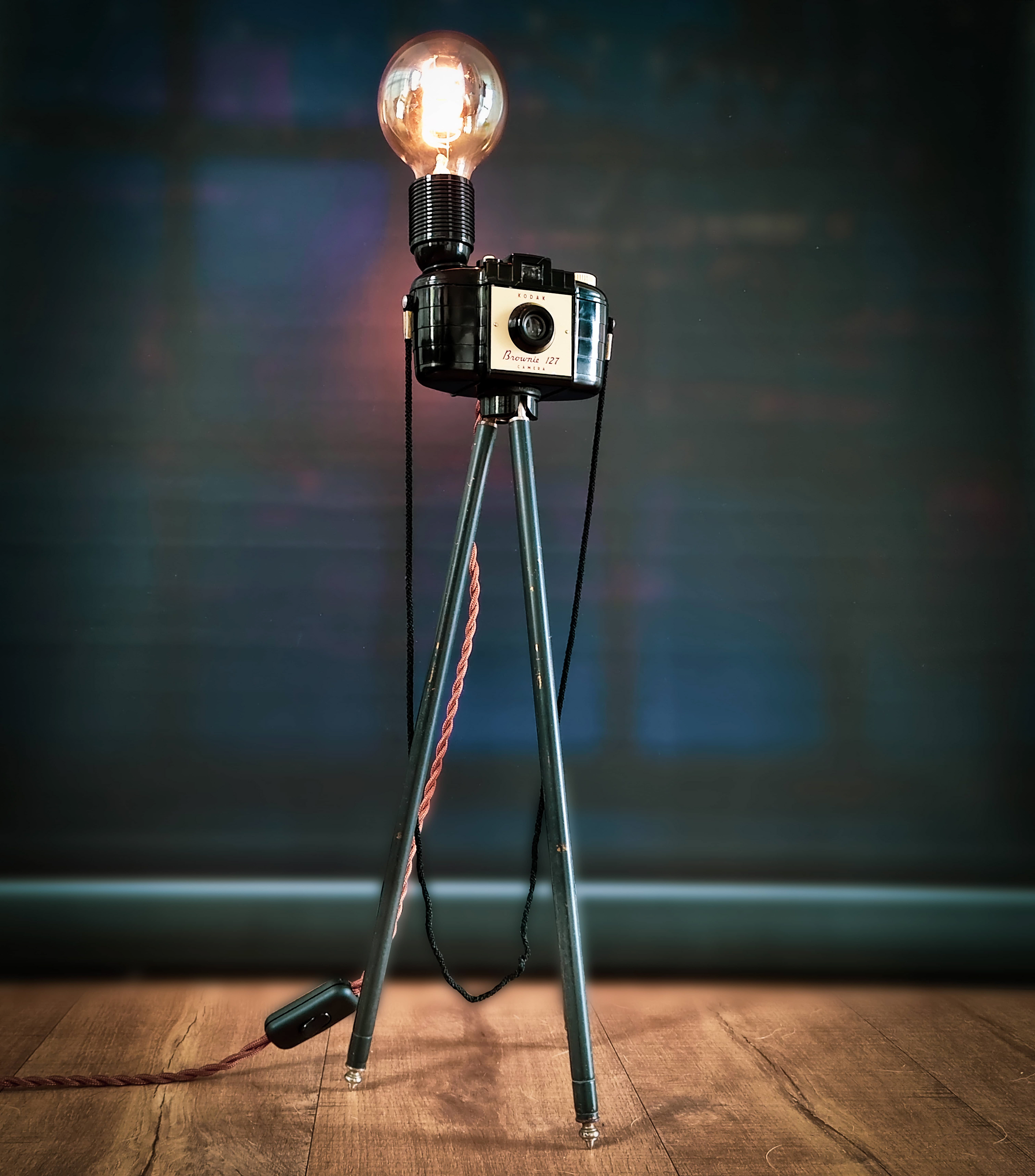 Tripod adjustable to different heights