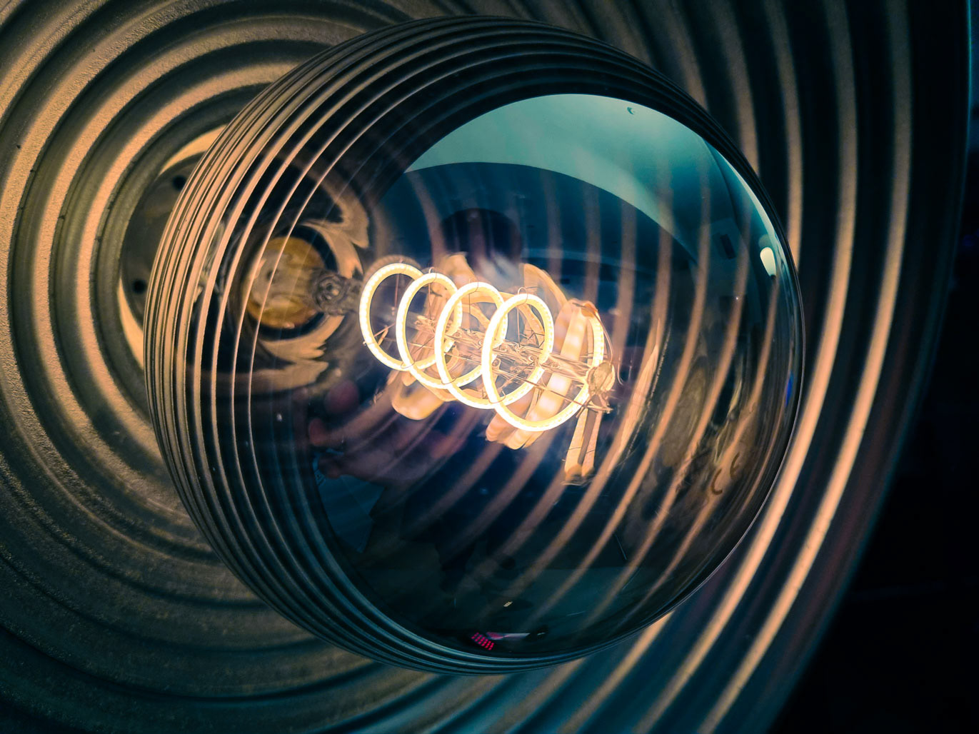 Mirrored oversized vintage Edison globe bulb with spiral filament