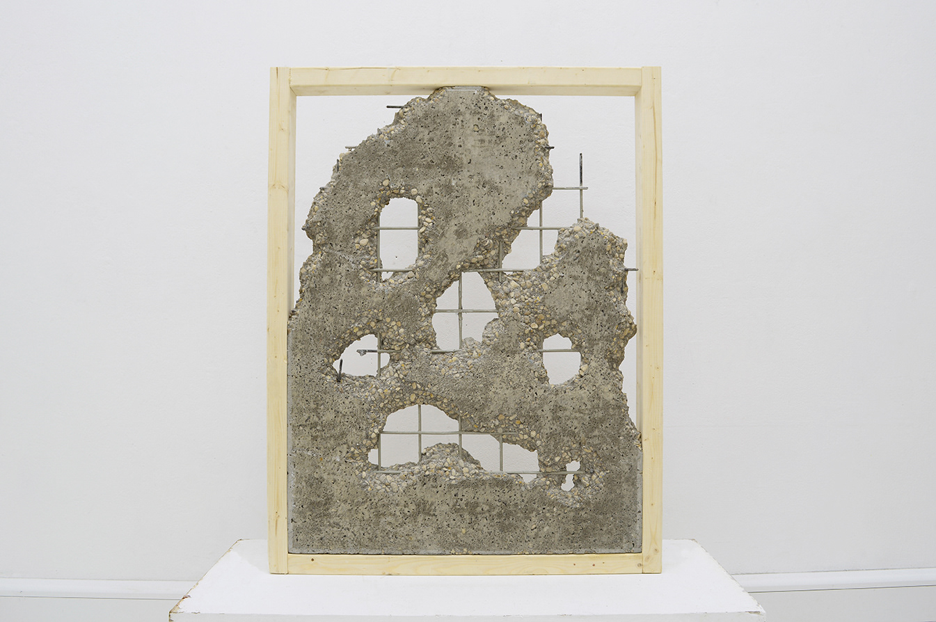 A sculptural form created from a series of raw and found material.