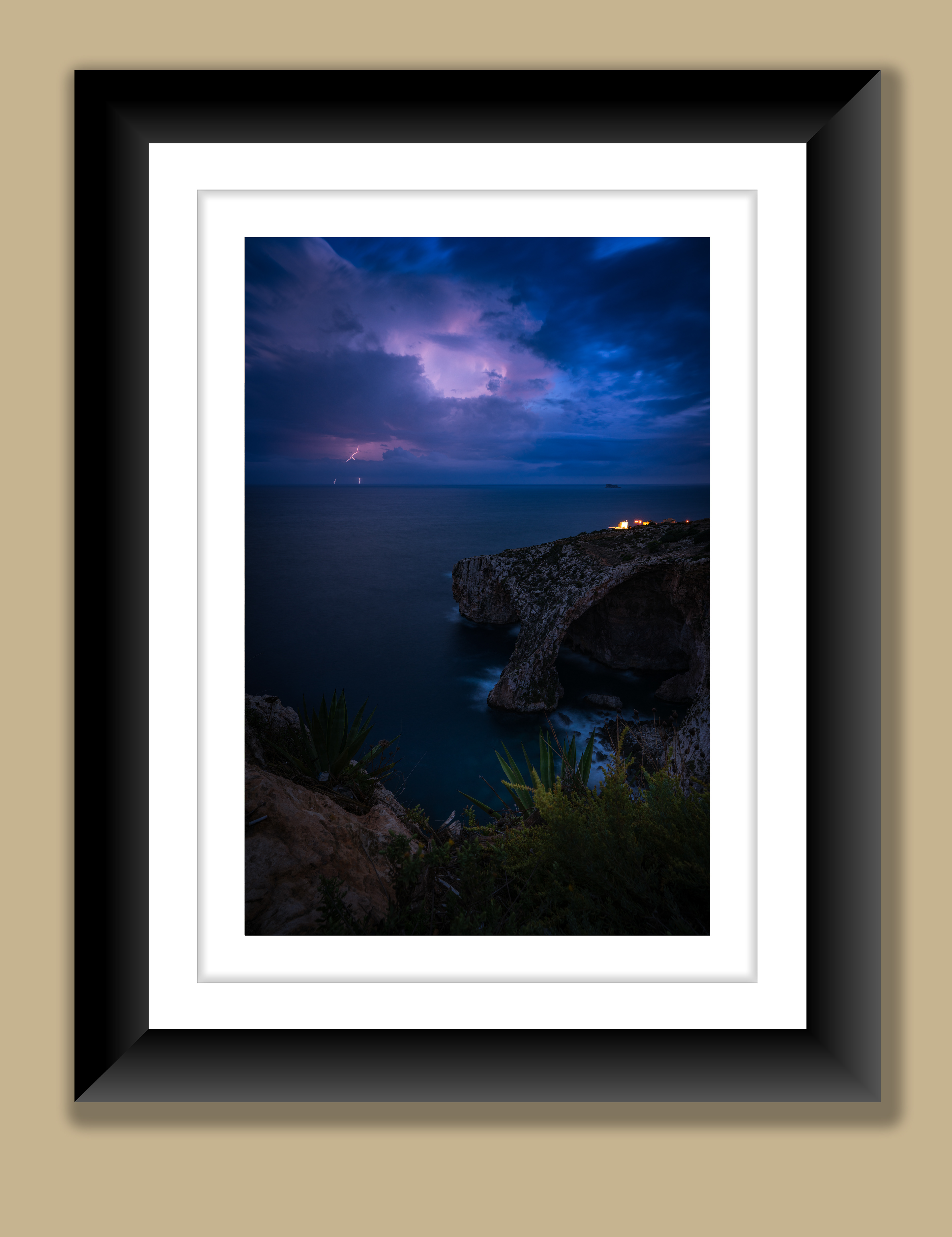 A beautiful fine art print of blue grotto during an approaching thunder storm. Thunder can be seen a few kilometers off the coast.