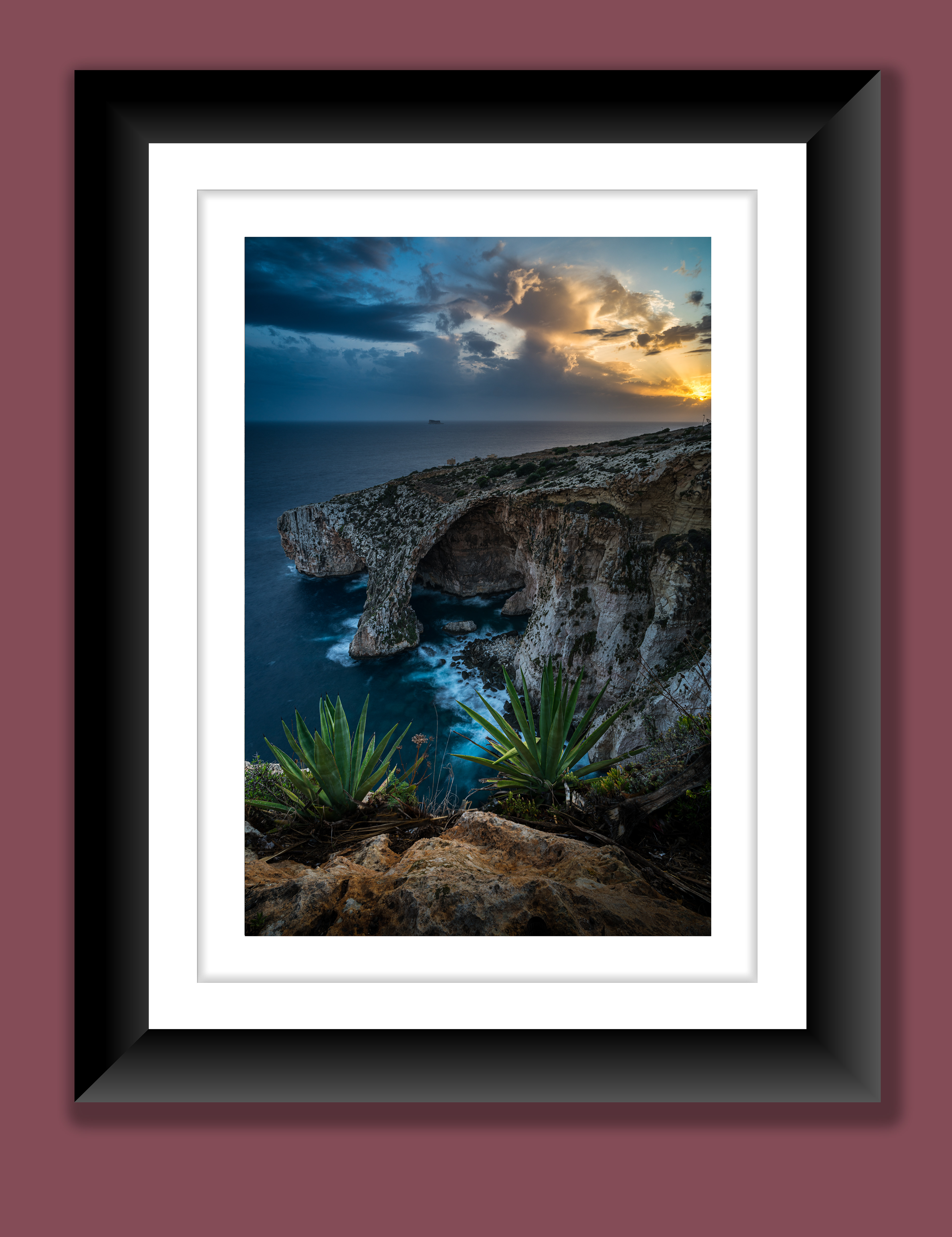 A beautiful fine art print of blue grotto, one of the most popular natural windows on the Maltese islands during sunset.