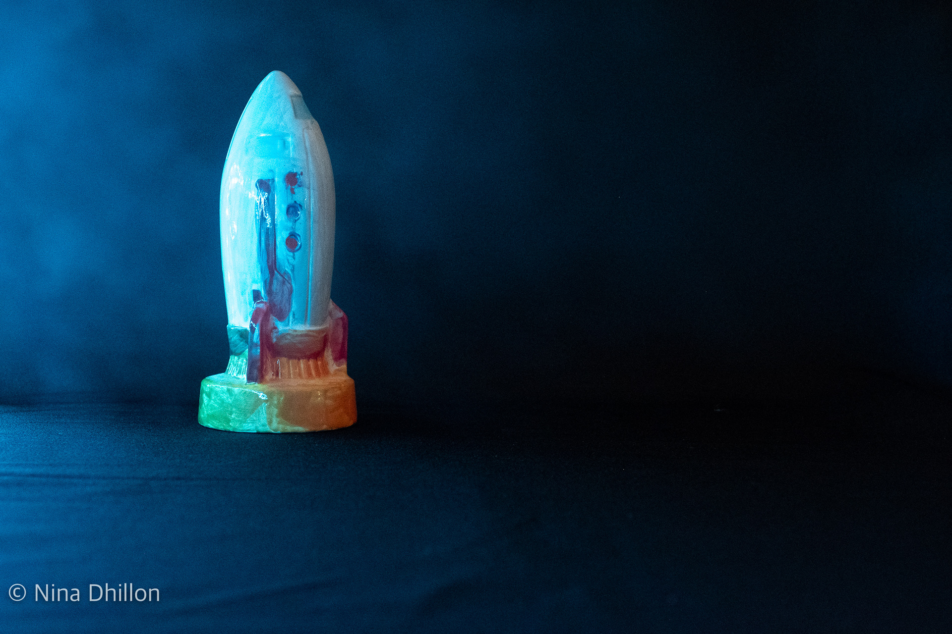 Still Life. Painted Rocket ship in fog. November 1, 2021. 1/60 sec at f/5.6 ISO 10000.