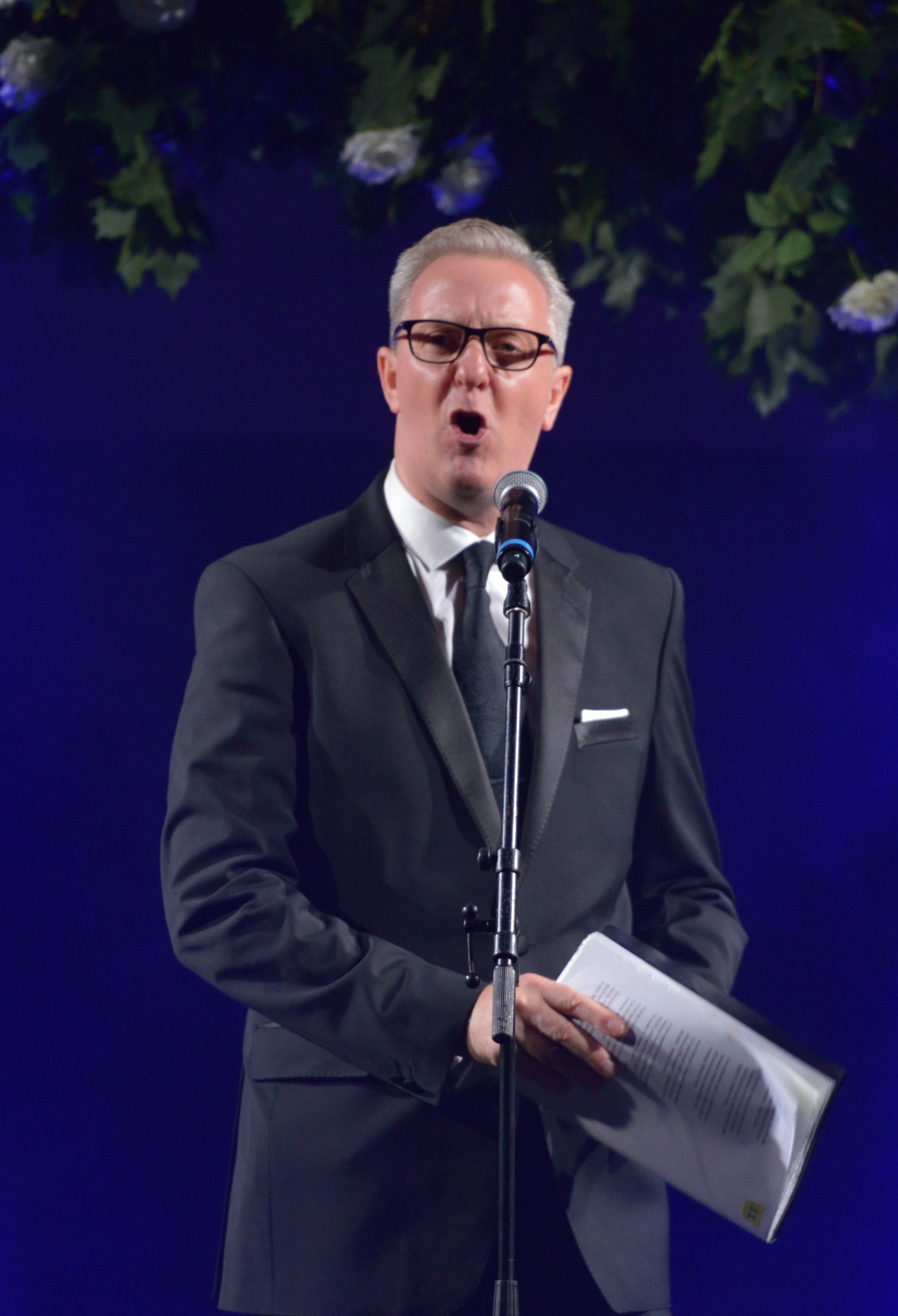 Manchester Poet, Tony Walsh on stage at the 2019 Manchester Fashion Festival - runway photographer