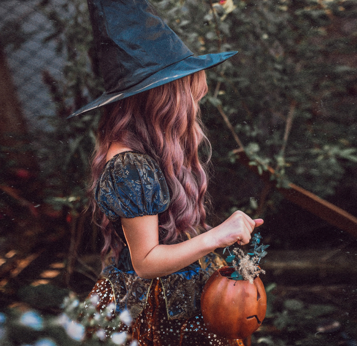 lindsey l ahmet graphic designer and photographer halloween marketing design blog image of little girl dressed up as a witch with a pumpkin