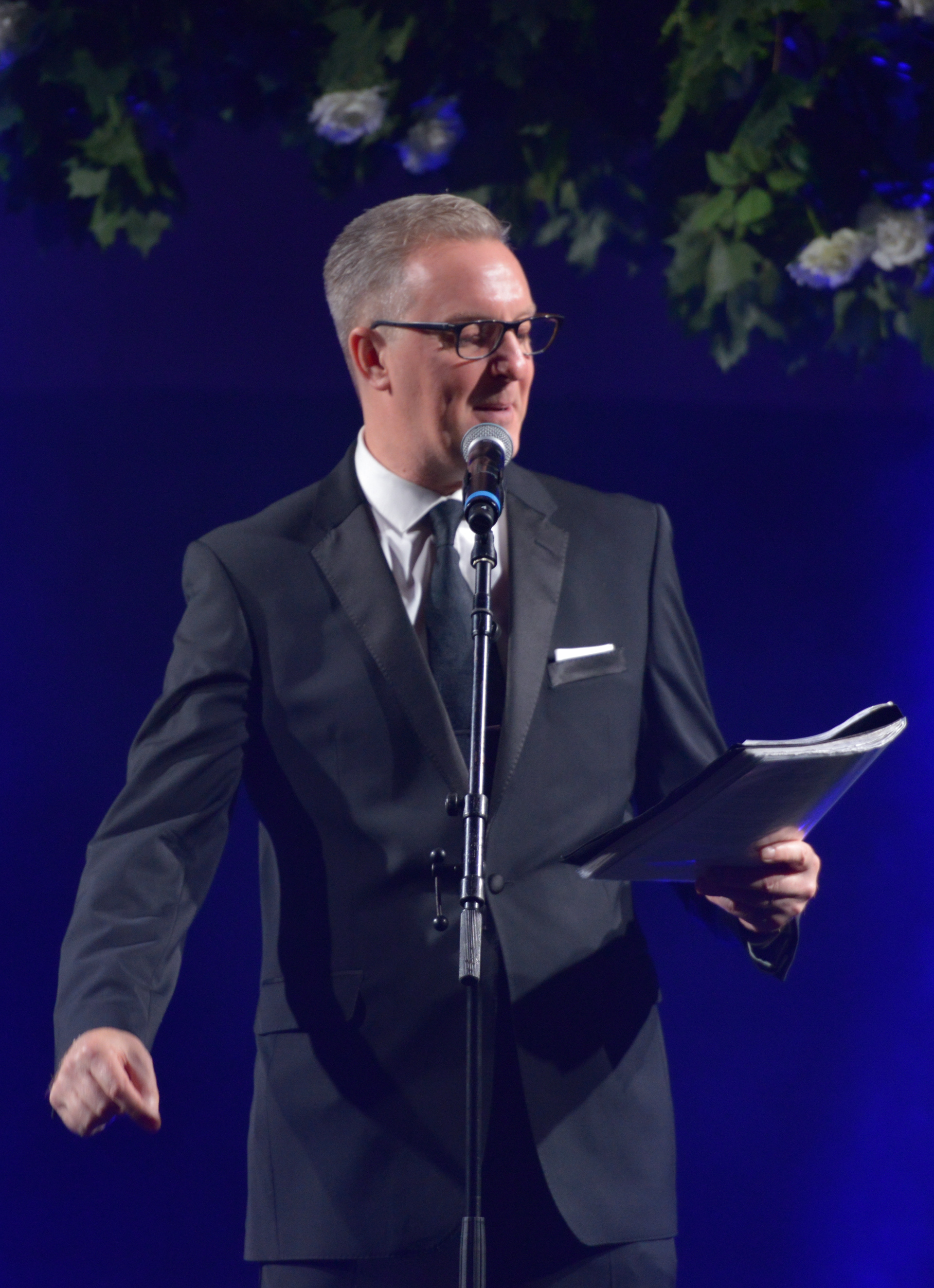 Poet Tony Walsh on stage at the 2019 Manchester Fashion Festival - event photographer