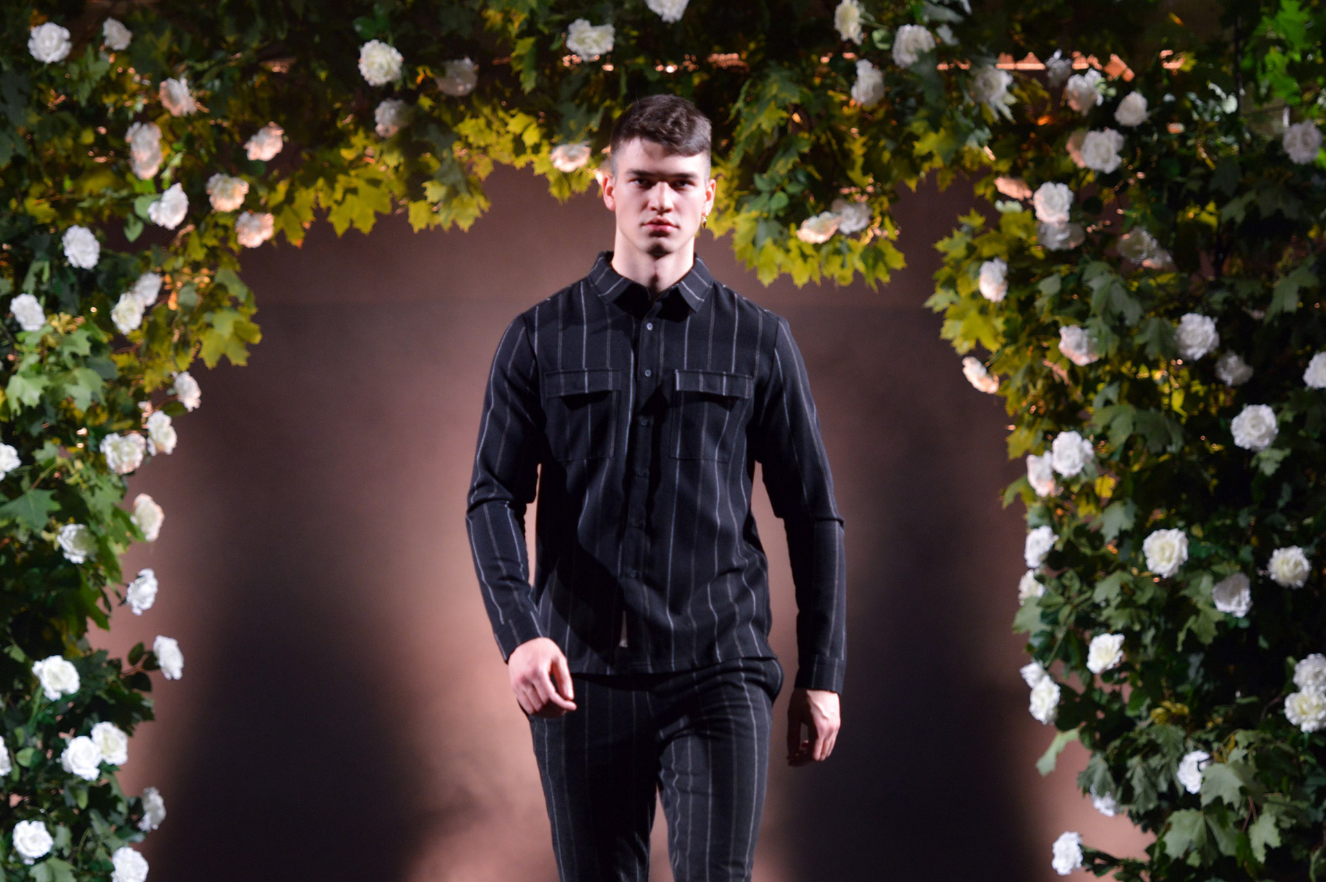 Model walking for Neon Rose at the 2019 Manchester Fashion Festival - runway photographer