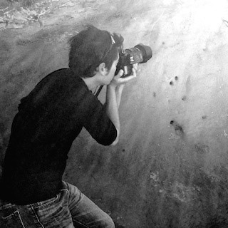heyengel holding a camera