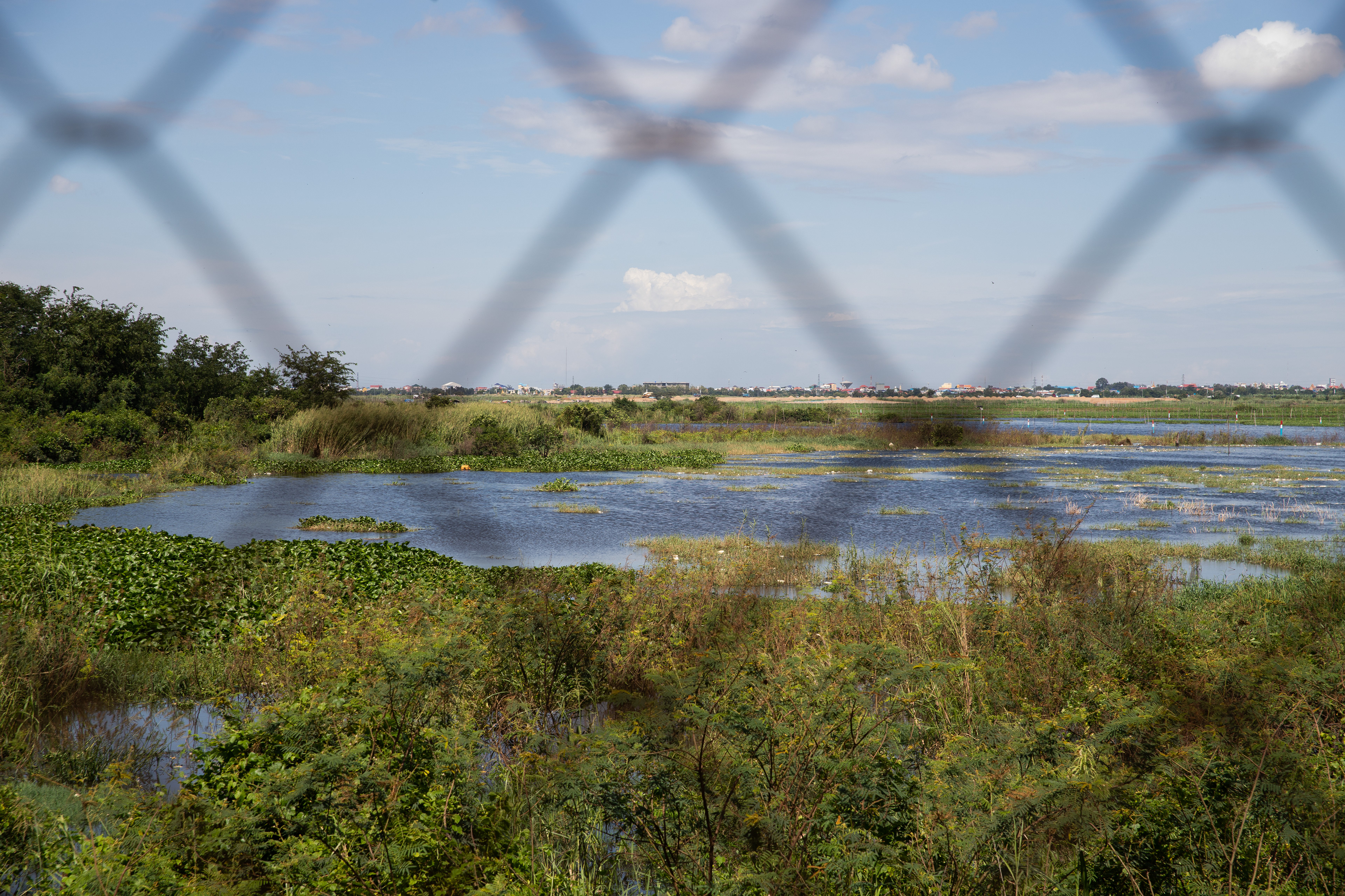 The area where many mass graves remain untouched, covered by water.