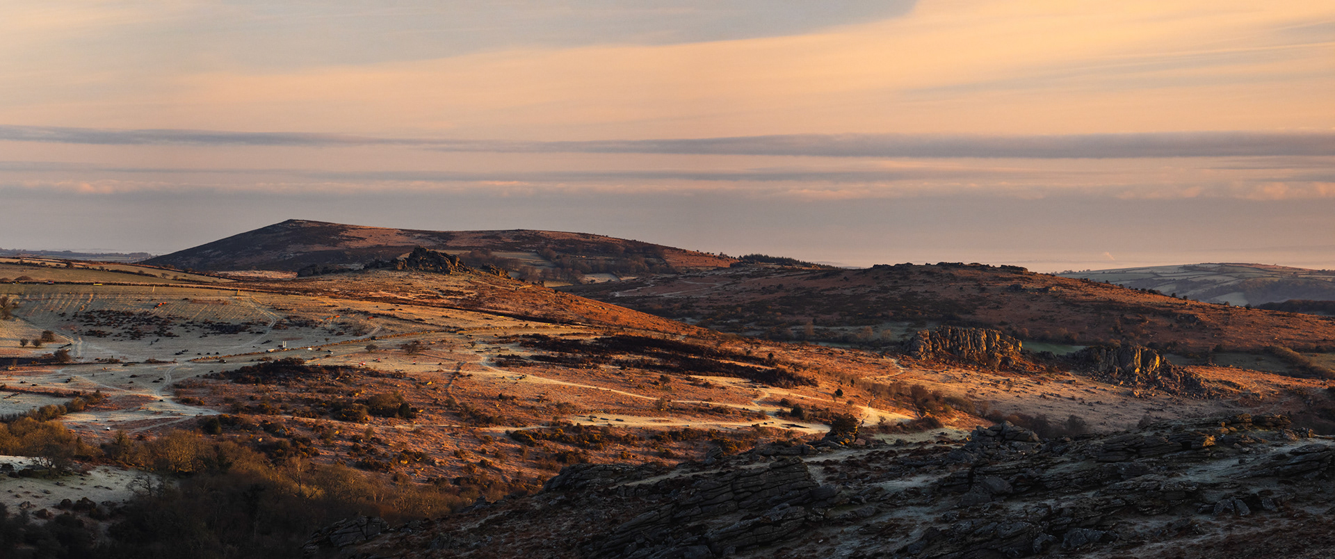 Holwell Tor and Hound Tor from Saddle Tor on a winter sunrise