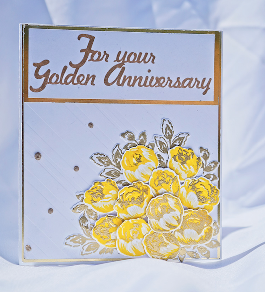 Multidimensional , multi layered roses with both color and gold embossing accents.