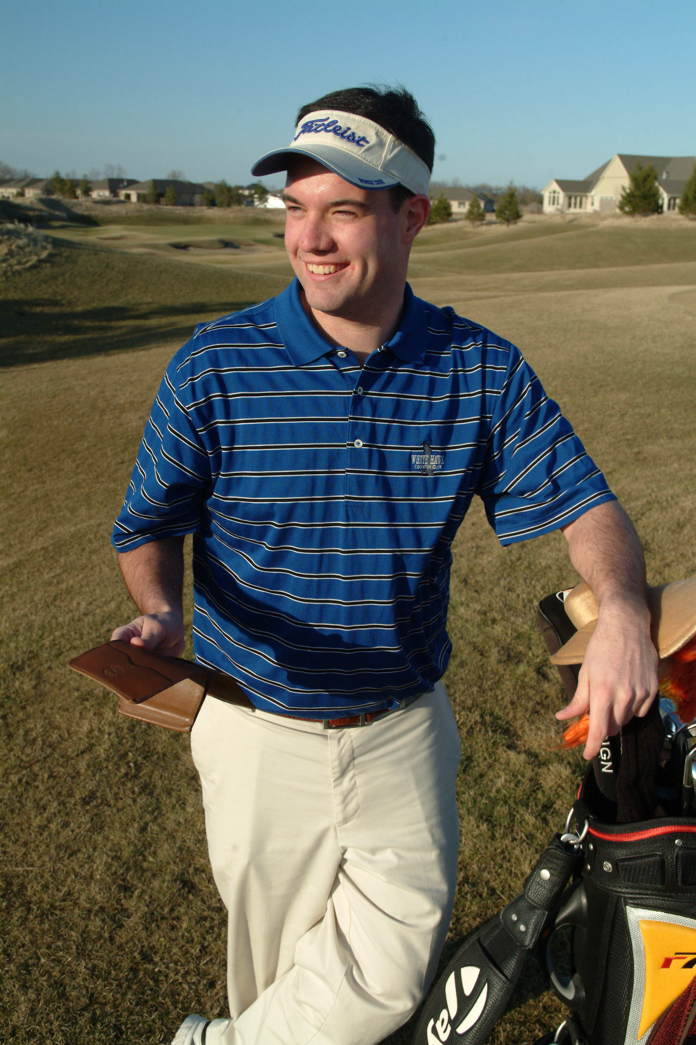 040208tvmGLFPESCHKE_2 Tony V. Martin CROWN POINT-Ed with his yardage book. CP golfer Ed Peschke is putting down his clubs to pick-up the bag of new client South African golfer Stacy Bregman as he caddies in the European Women's Golf Tour. Ed heads to Spain next week to start his new job.