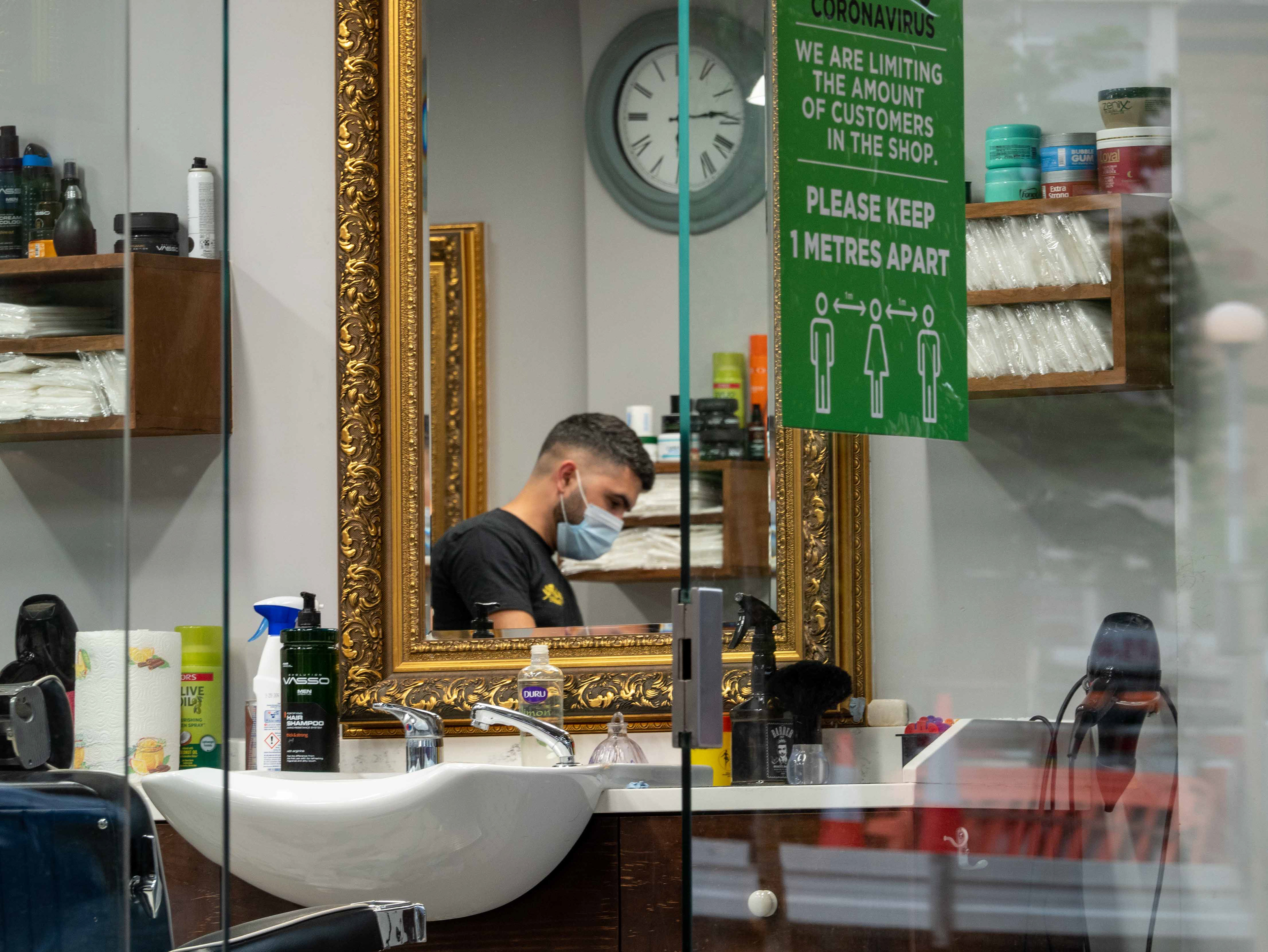 Limited numbers and face masks in the barbers