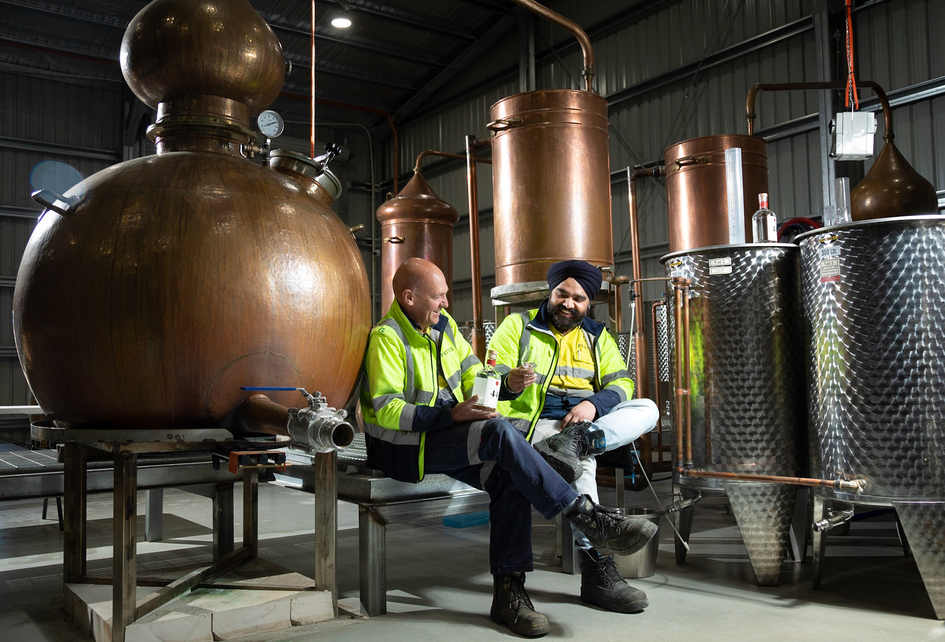 Former Senator for Tasmania Stephen Parry now executive chairman of Pattex Distillery, with head distiller and director Raj Charan Singh.