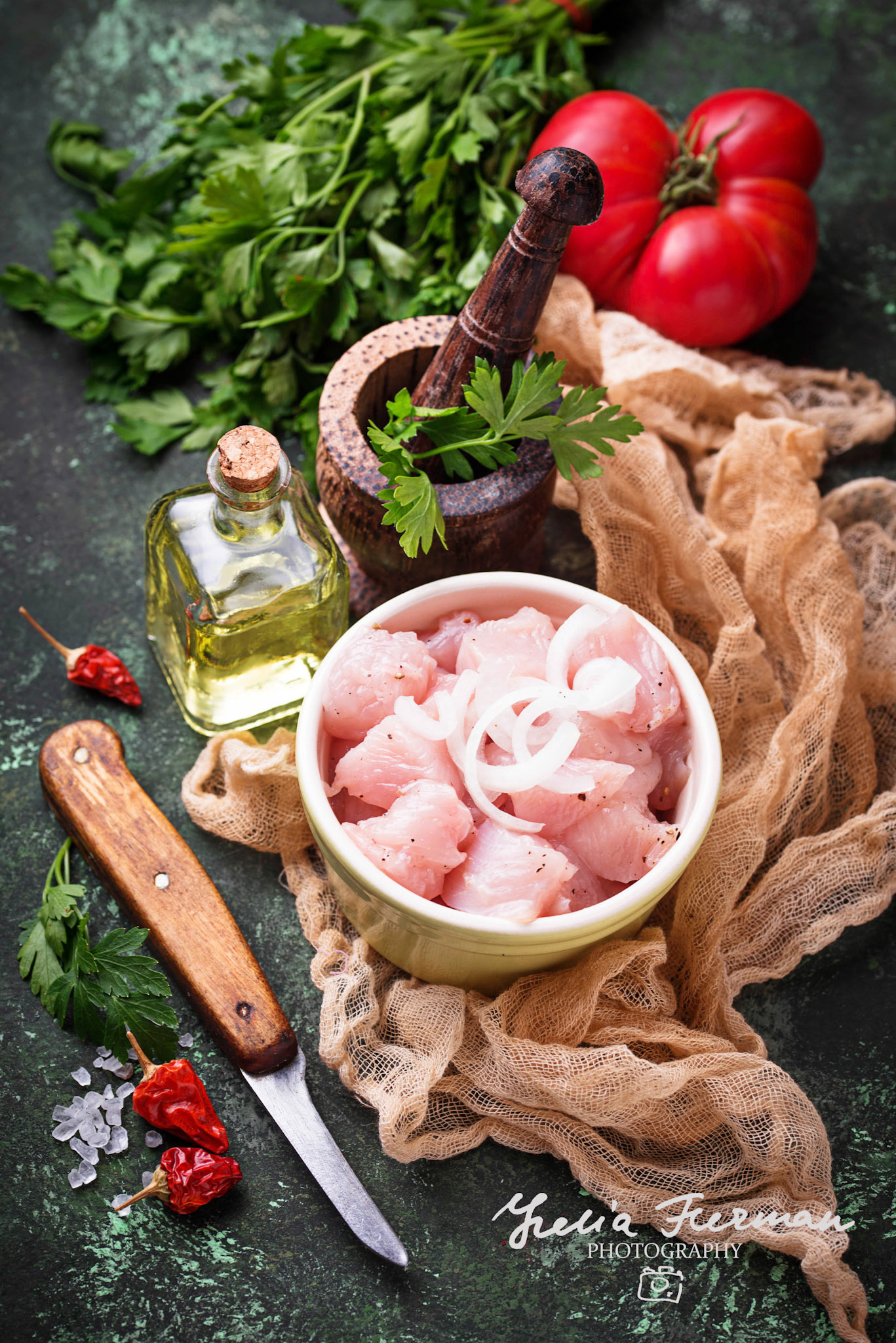 Raw sliced chicken meat ready for cooking. Selective focus