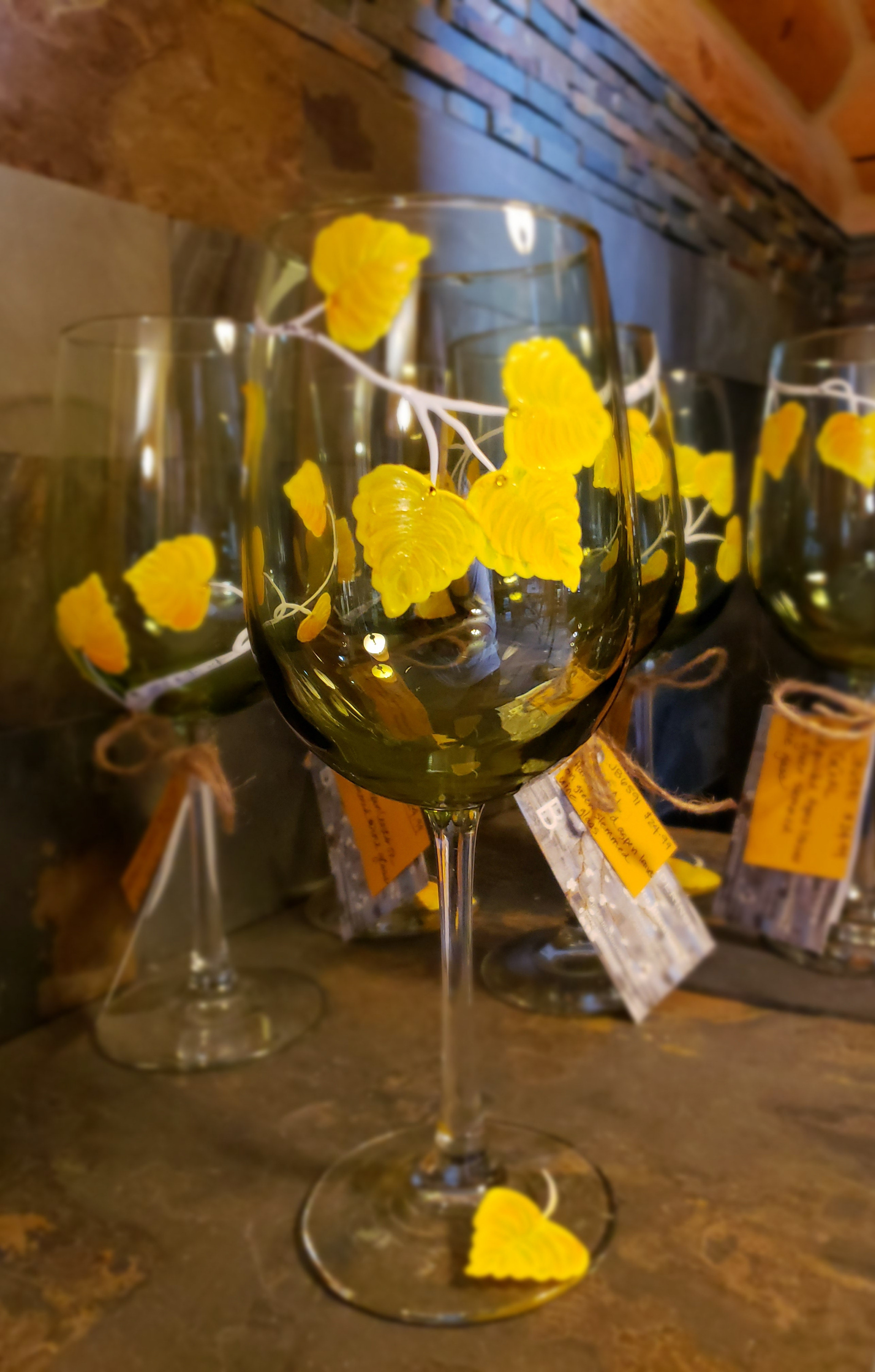 Autumn Aspen Leaves on Green Wine Glass