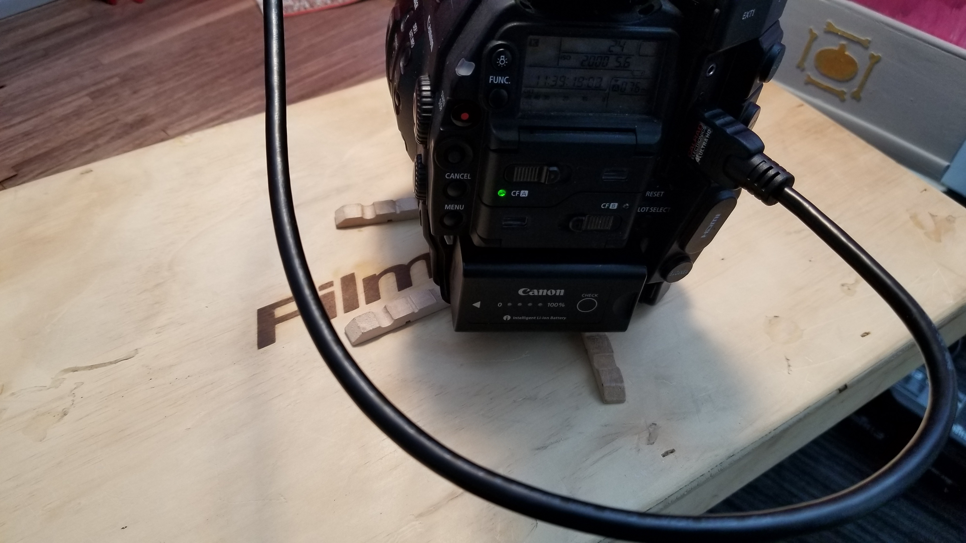 Teeny make-shift shims. Because the only moving elements in this scene are animated, the backgrounds were shot live.